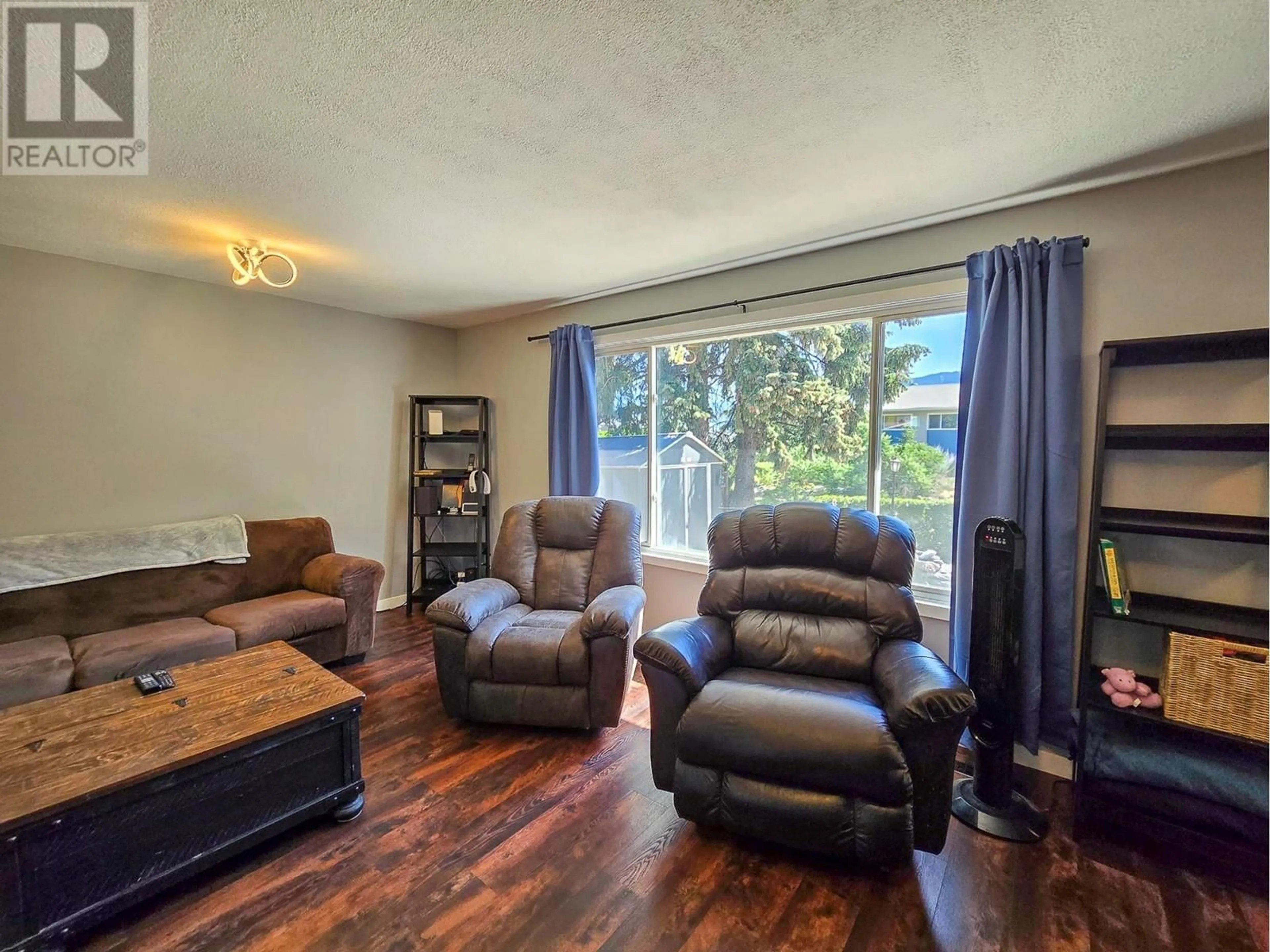 Living room, wood floors for 4108 35A Street, Vernon British Columbia V1T6W1