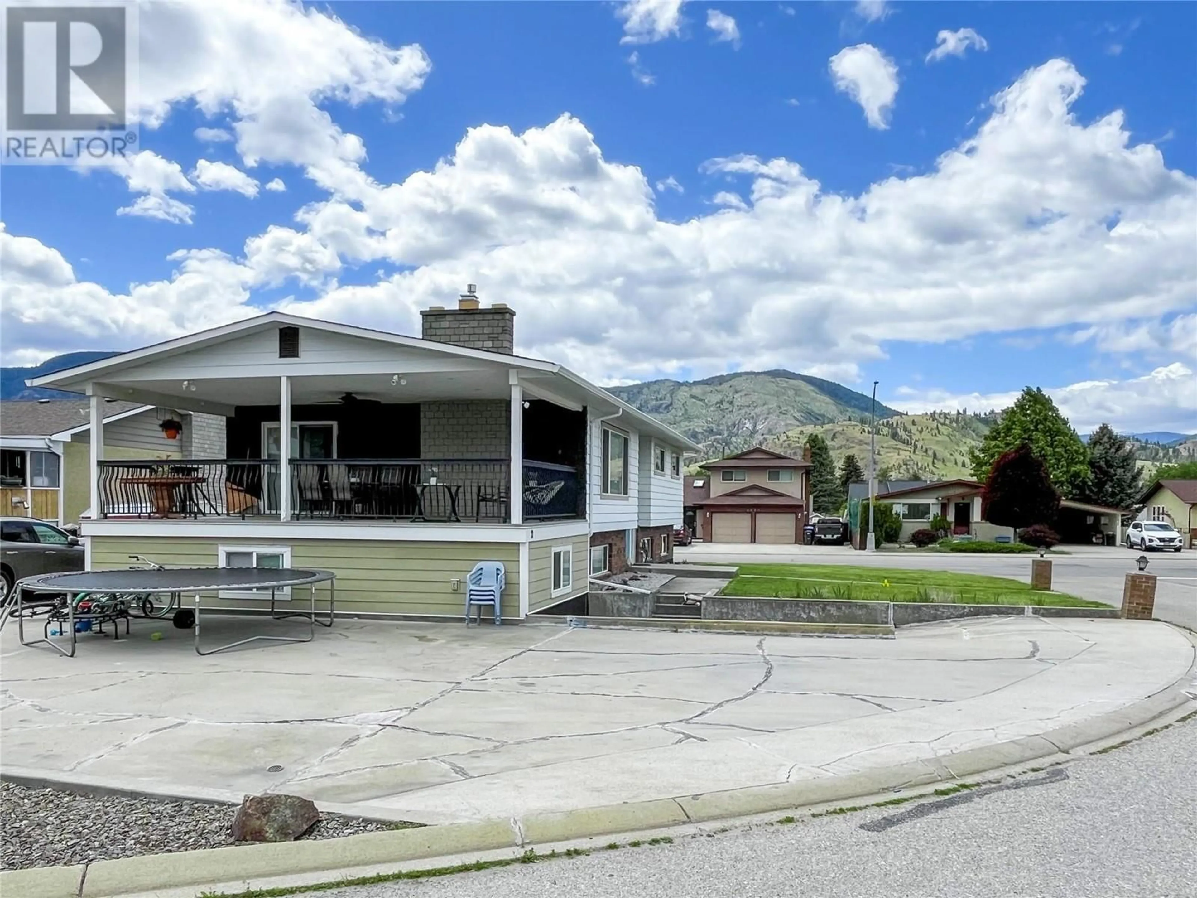 Frontside or backside of a home, the street view for 102 MCGRAW Court, Penticton British Columbia V2A6Y6