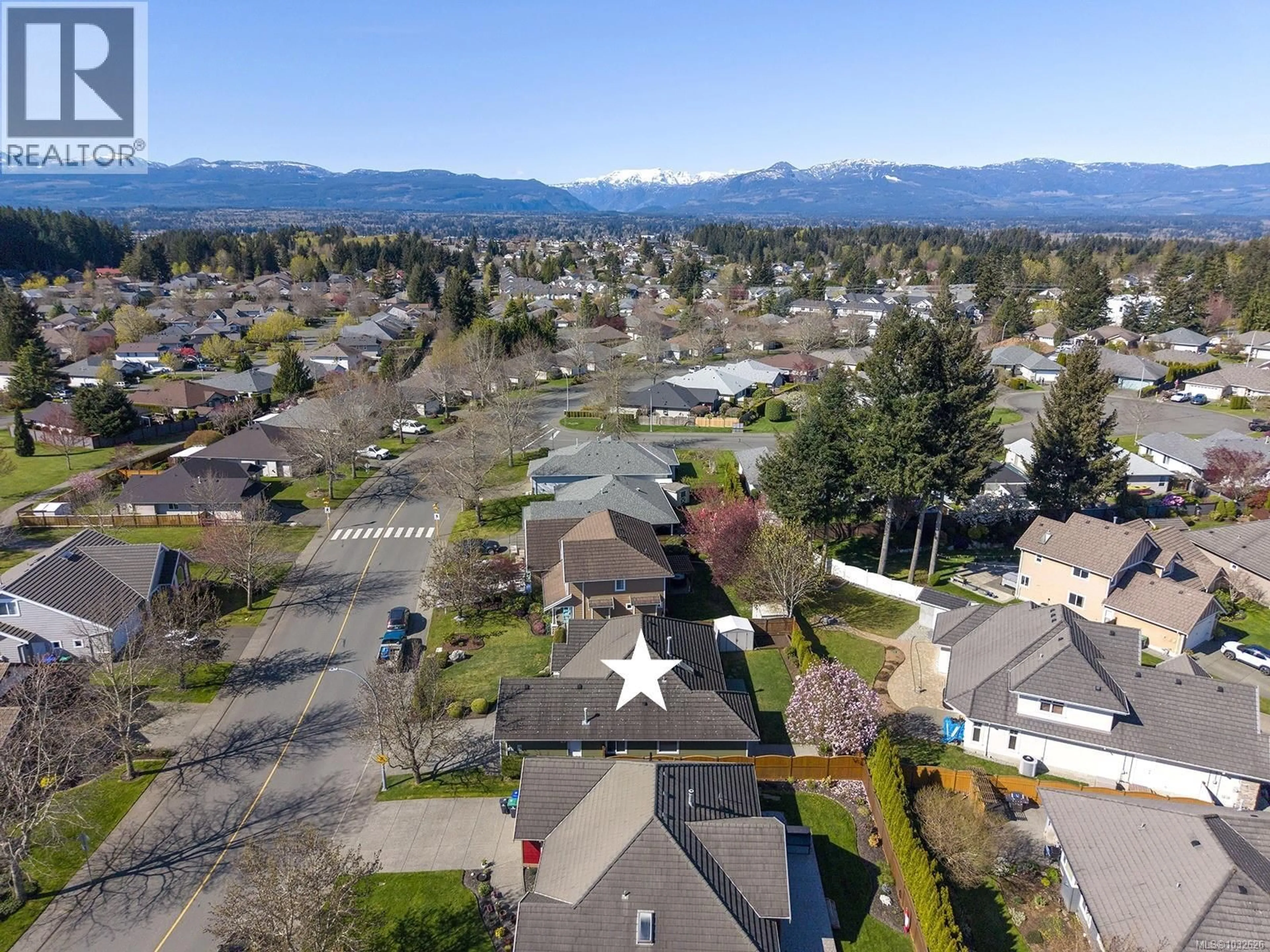 A pic from outside/outdoor area/front of a property/back of a property/a pic from drone, mountain view for 2400 IDIENS WAY, Courtenay British Columbia V9N9J3