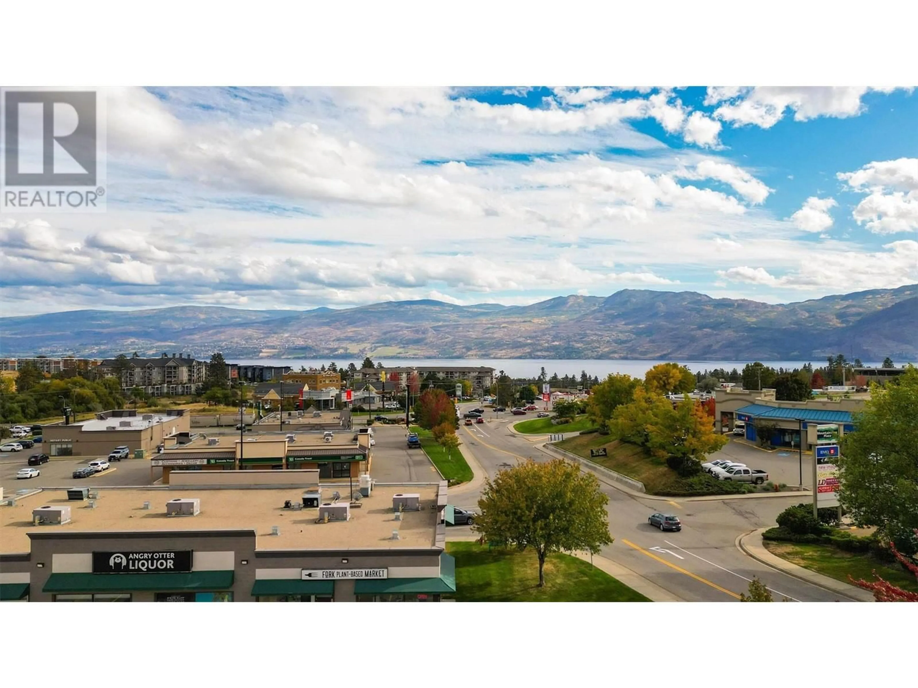 A pic from outside/outdoor area/front of a property/back of a property/a pic from drone, mountain view for 405 - 3645 GOSSET ROAD, West Kelowna British Columbia V1Z4C9