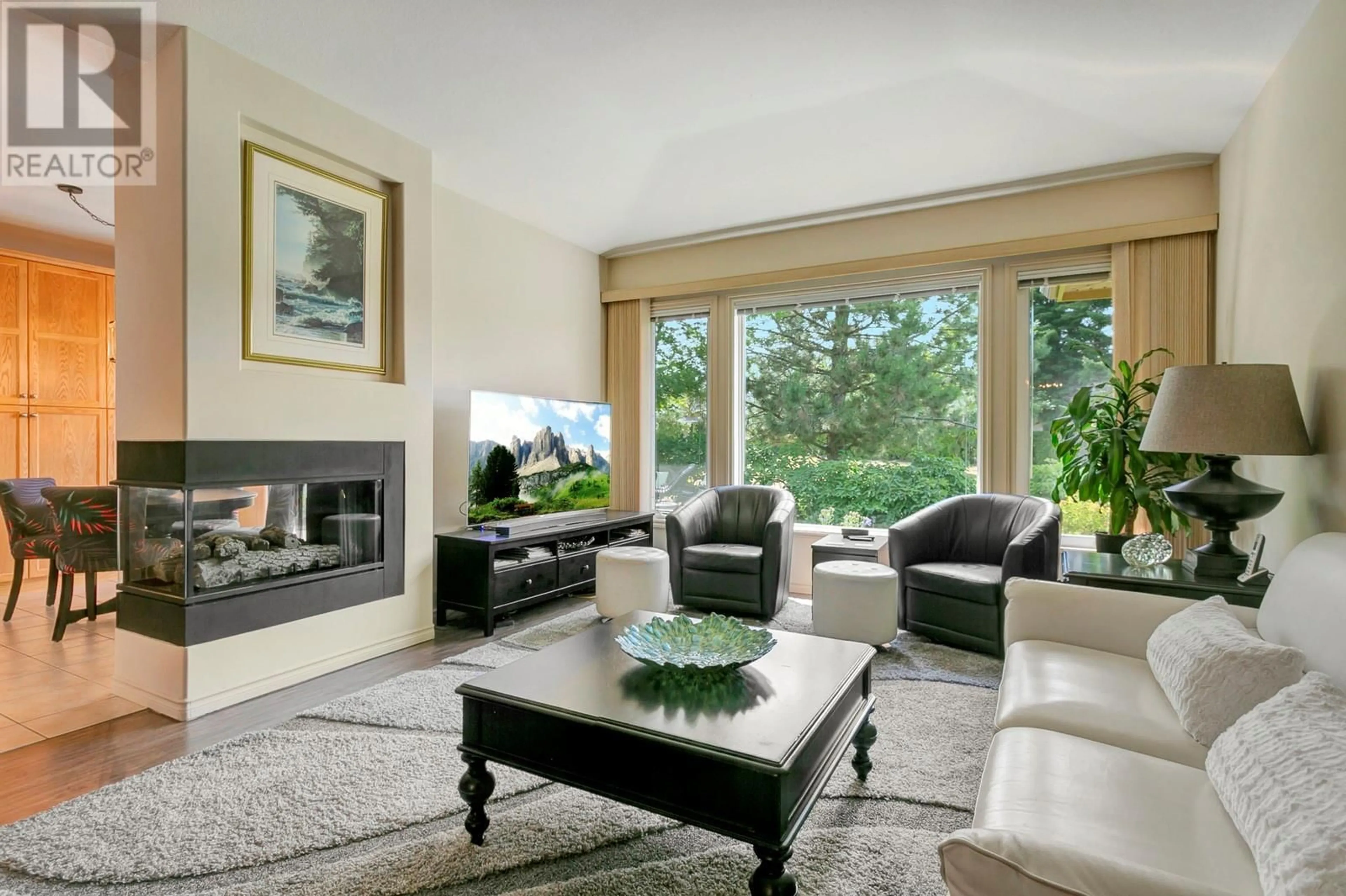 Living room, wood floors for 3924 Gallaghers Parkway, Kelowna British Columbia V1W3Z8