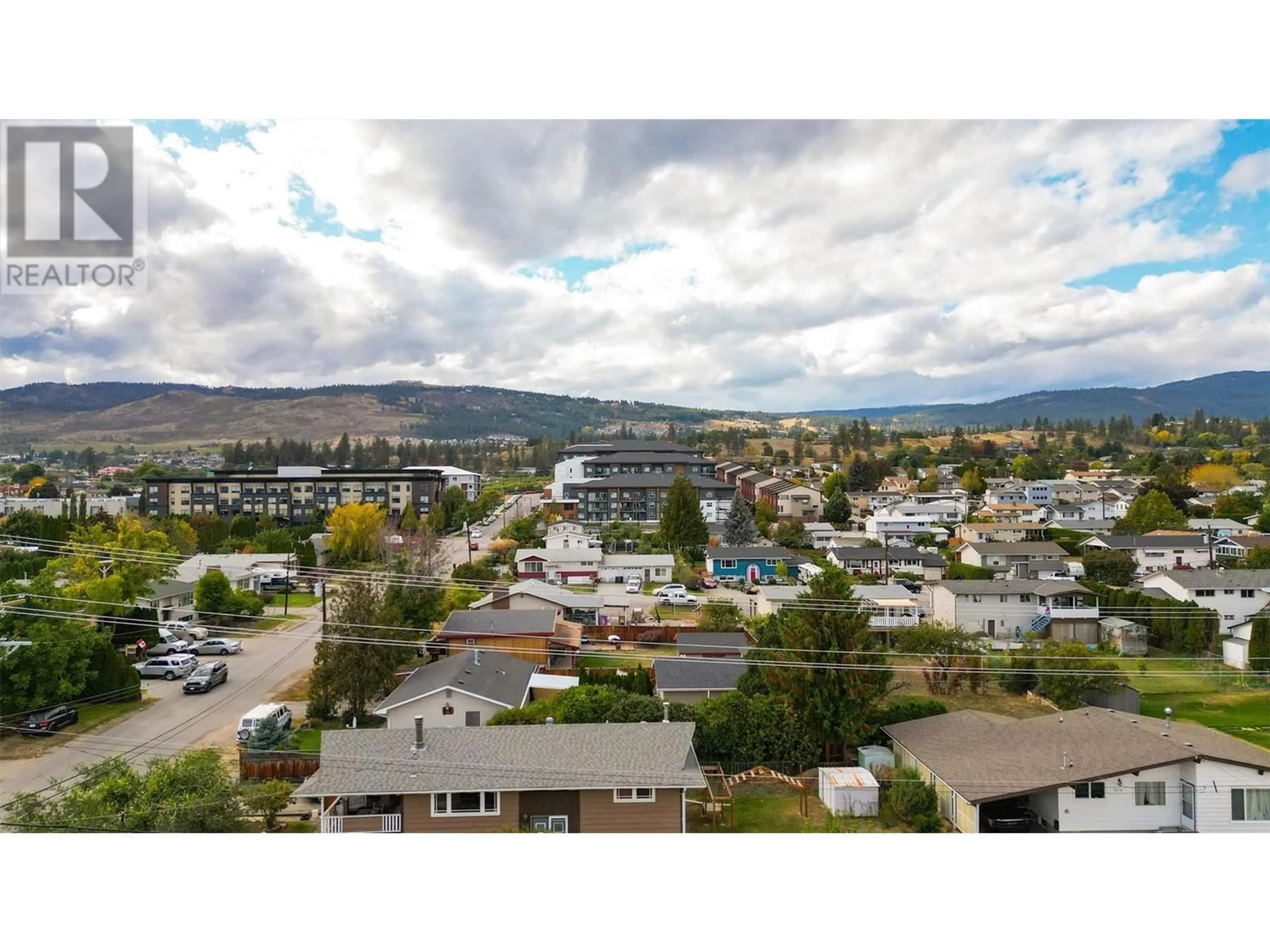 A pic from outside/outdoor area/front of a property/back of a property/a pic from drone, mountain view for 210 - 3645 GOSSET ROAD, West Kelowna British Columbia V1Z4C9