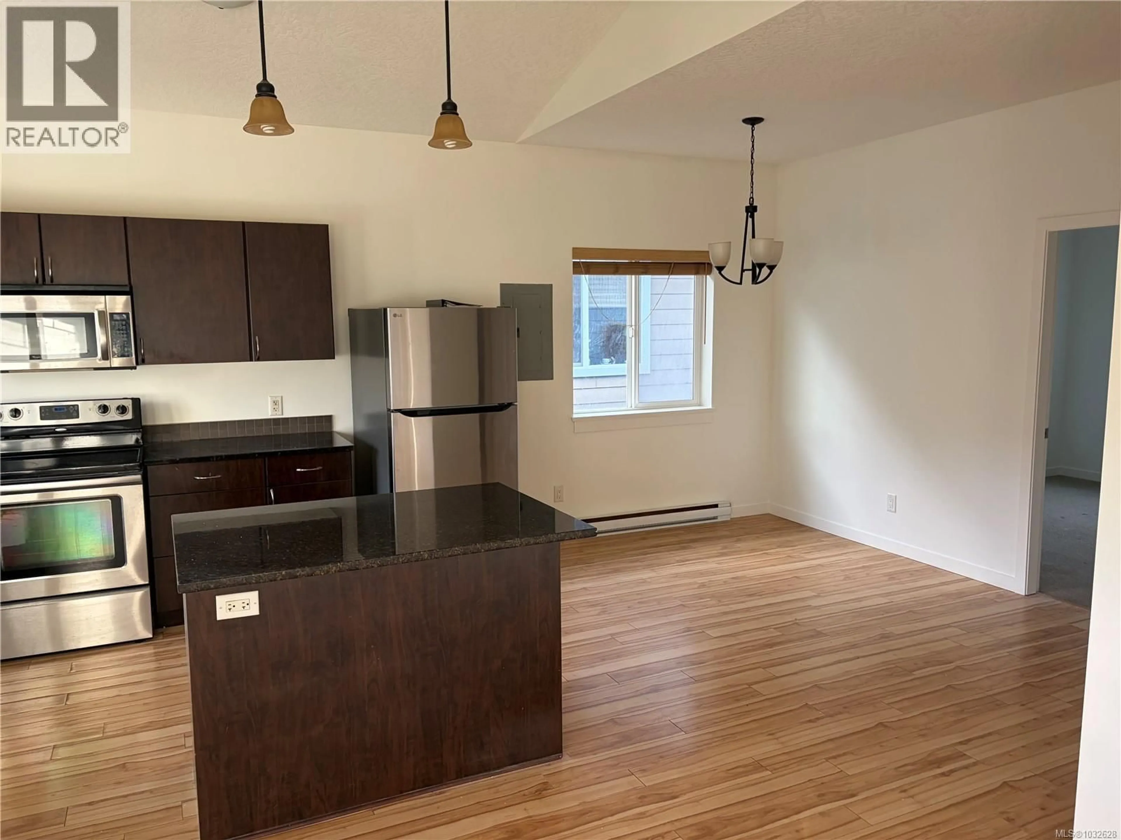 Open concept kitchen, wood/laminate floor for 2918 GOLDEN SPIKE PLACE, Langford British Columbia V9B0B2