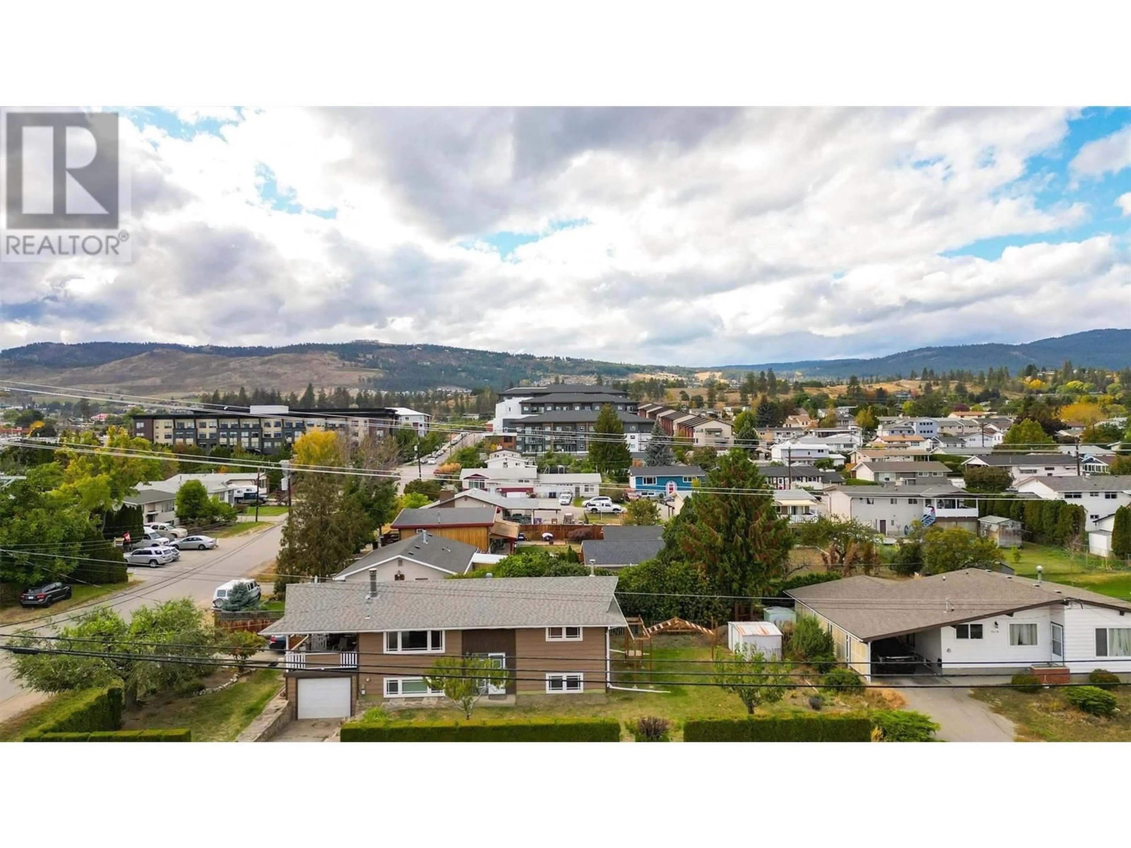 A pic from outside/outdoor area/front of a property/back of a property/a pic from drone, mountain view for 310 - 3645 GOSSET ROAD, West Kelowna British Columbia V1Z4C9