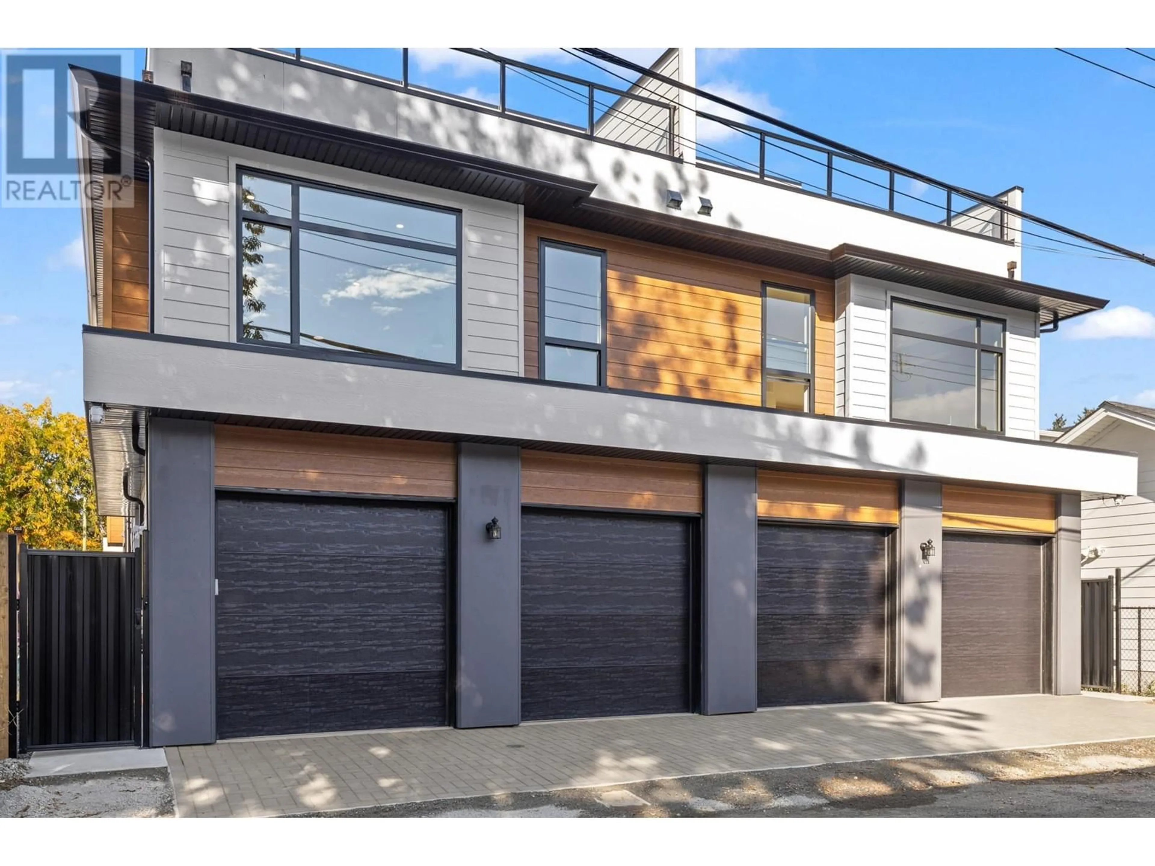 Home with brick exterior material for 751 Fuller Avenue Unit# 1, Kelowna British Columbia V1Y6X2