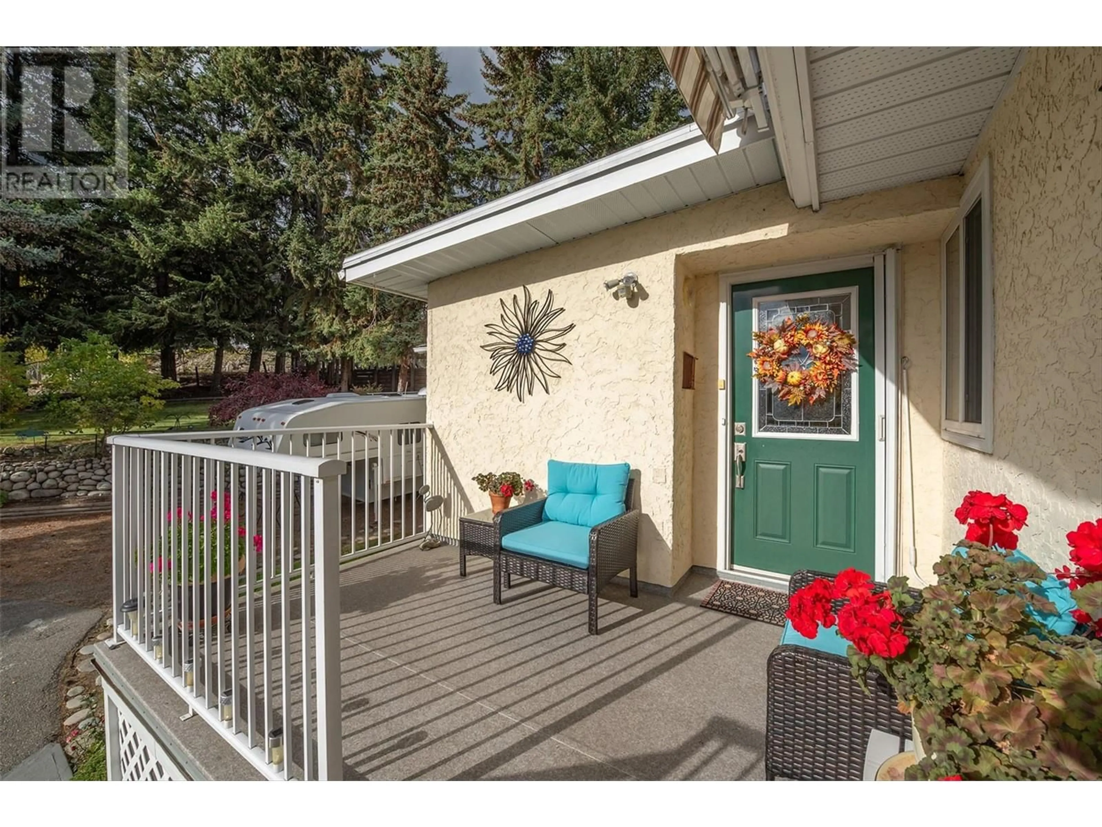 Patio, the fenced backyard for 6050 Beatrice Road, Peachland British Columbia V0H1X4