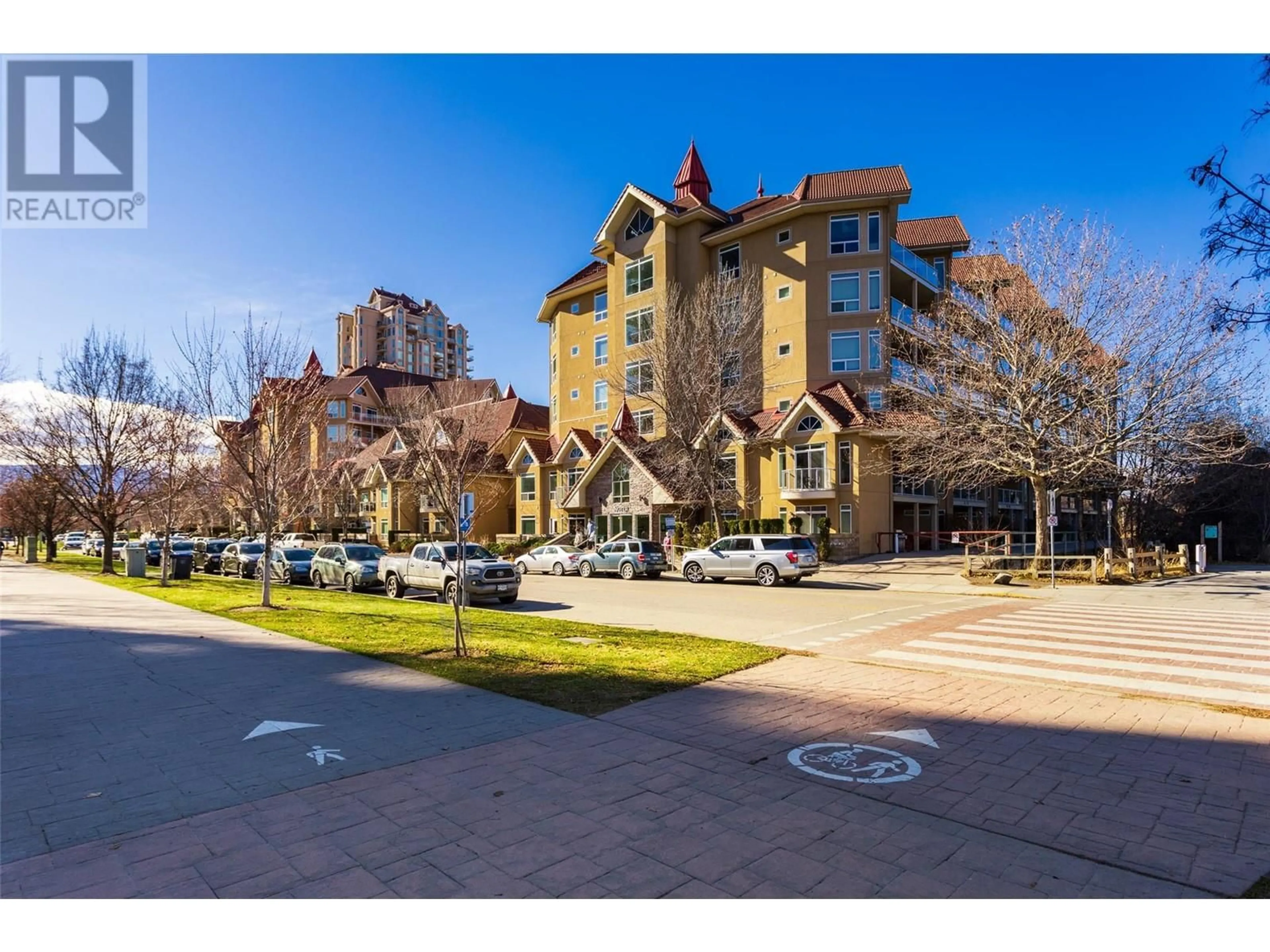 A pic from exterior of the house or condo, the street view for 1088 Sunset Drive Unit# 306, Kelowna British Columbia V1Y9W1