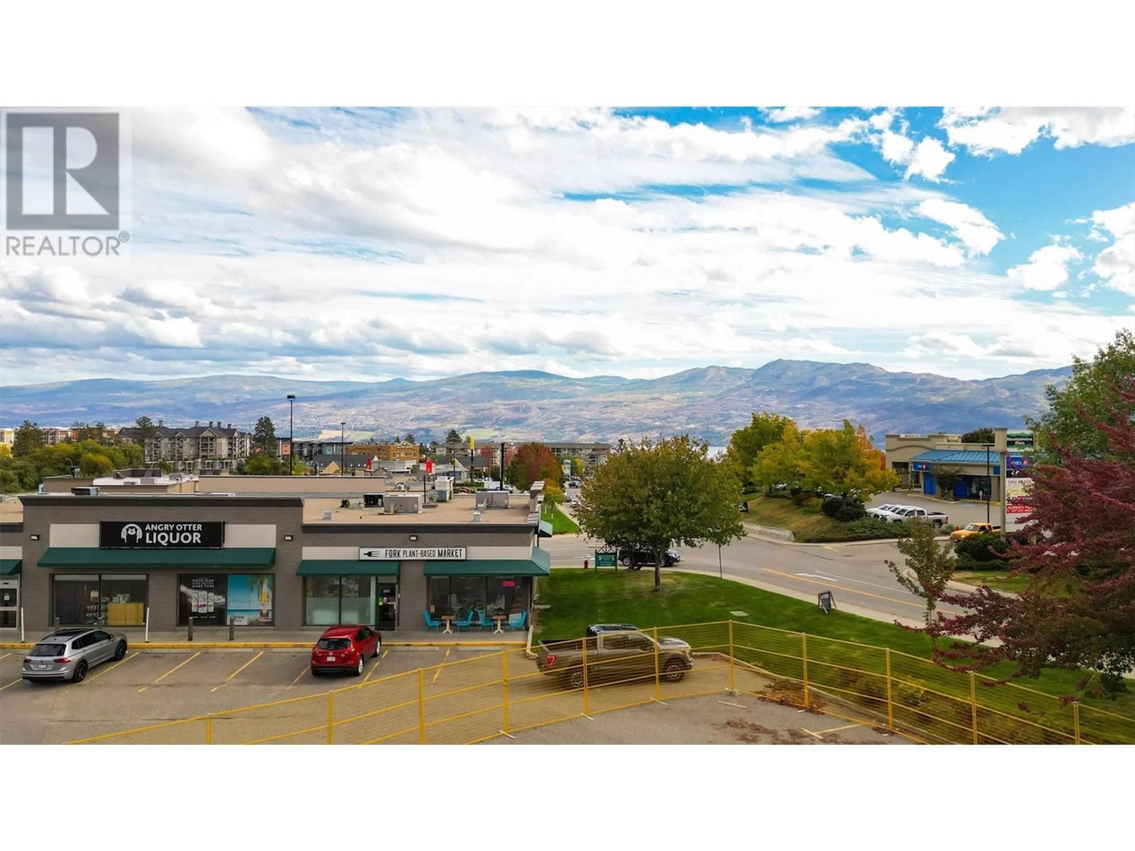 A pic from outside/outdoor area/front of a property/back of a property/a pic from drone, mountain view for 203 - 3645 GOSSET ROAD, West Kelowna British Columbia V1Z4C9