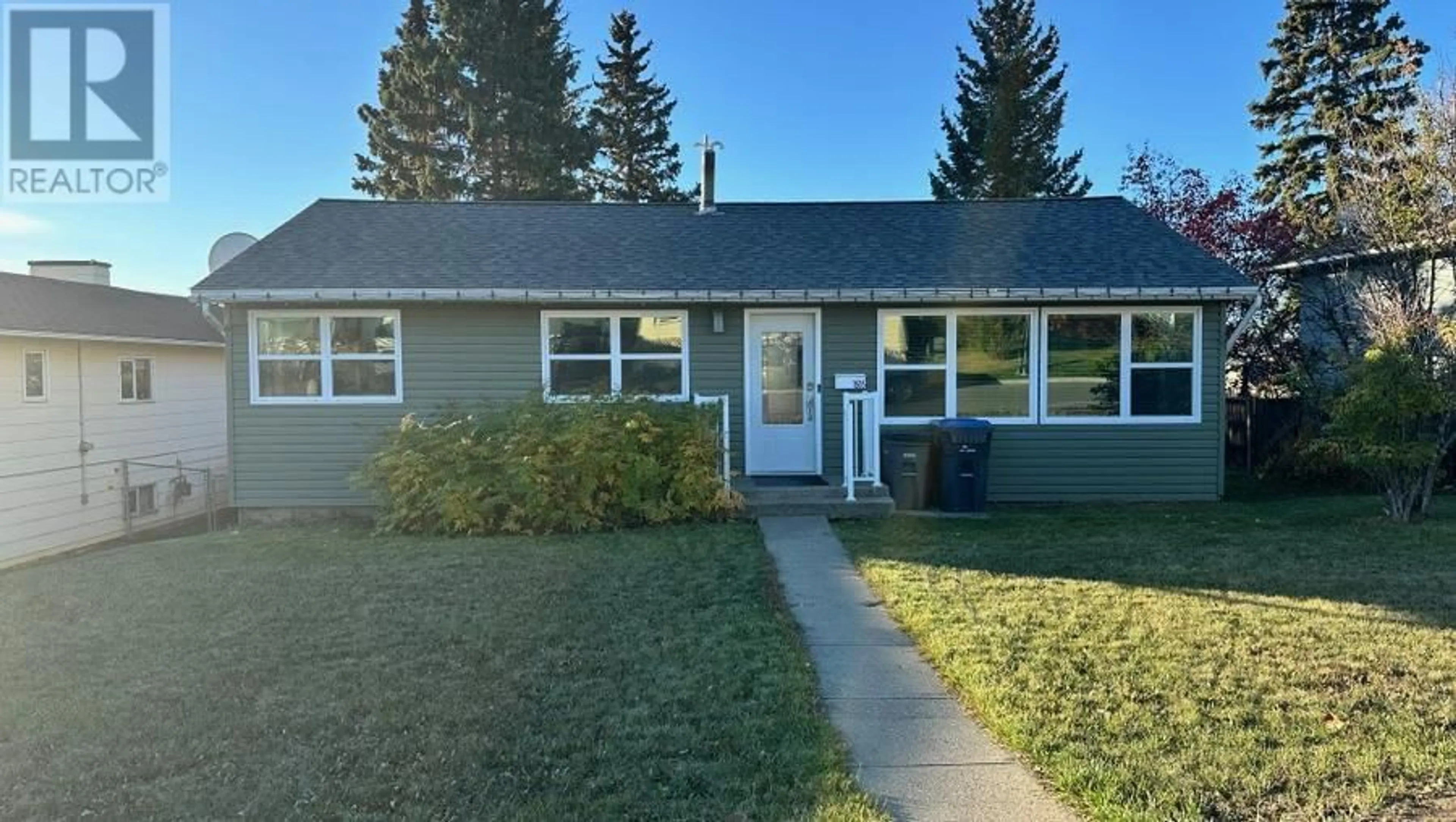 A pic from exterior of the house or condo, the front or back of building for 1505 95 Avenue, Dawson Creek British Columbia V1G1J9