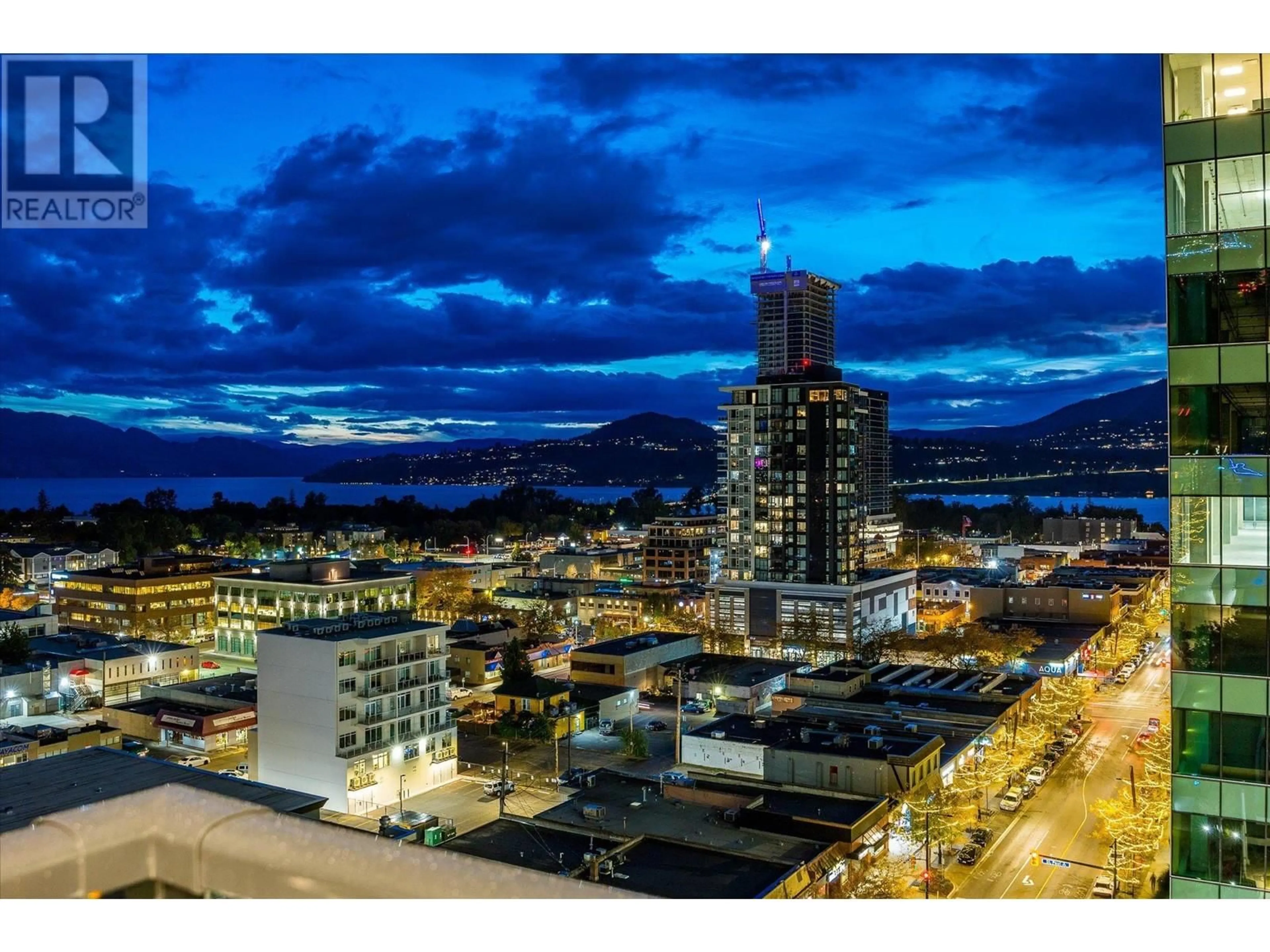 A pic from exterior of the house or condo, the view of city buildings for 1488 Bertram Street Unit# 1403, Kelowna British Columbia V1Y6P2