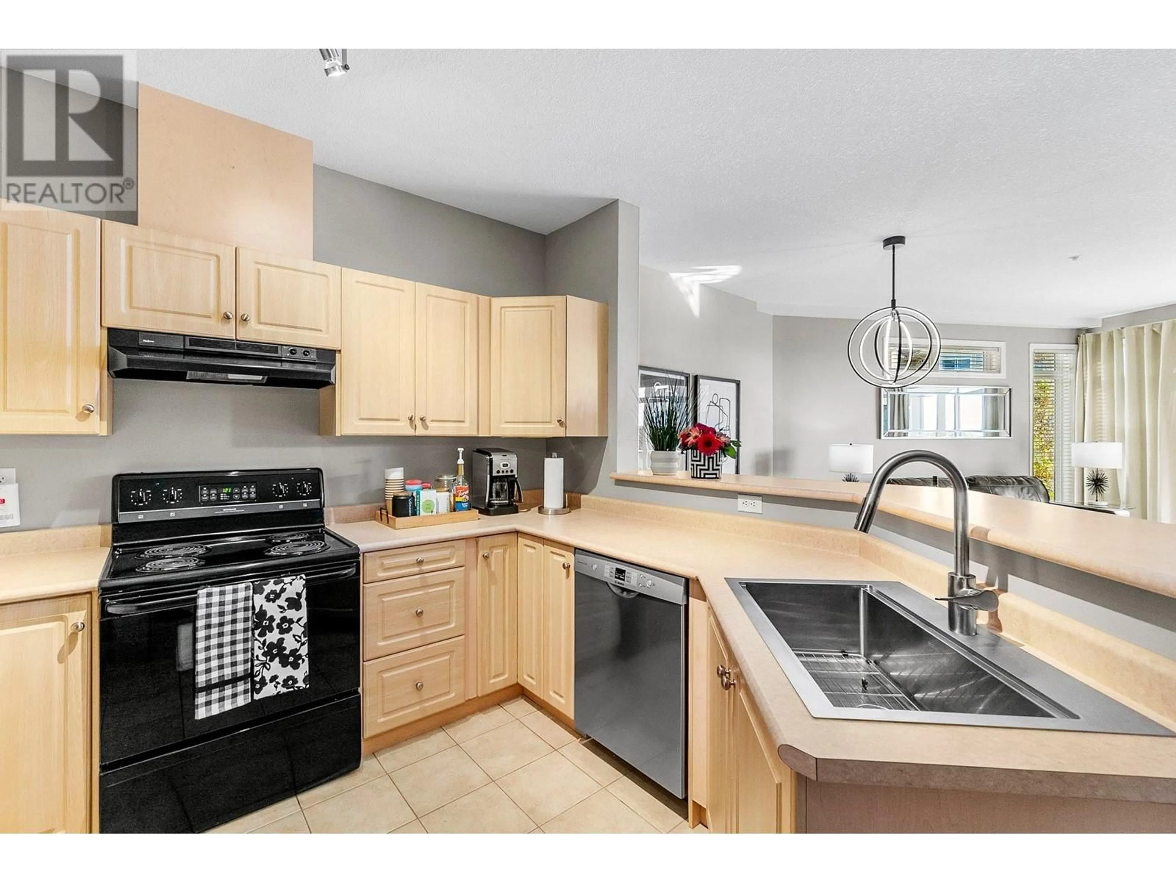 Standard kitchen, wood floors for 1088 Sunset Drive Unit# 409, Kelowna British Columbia V1Y9W1