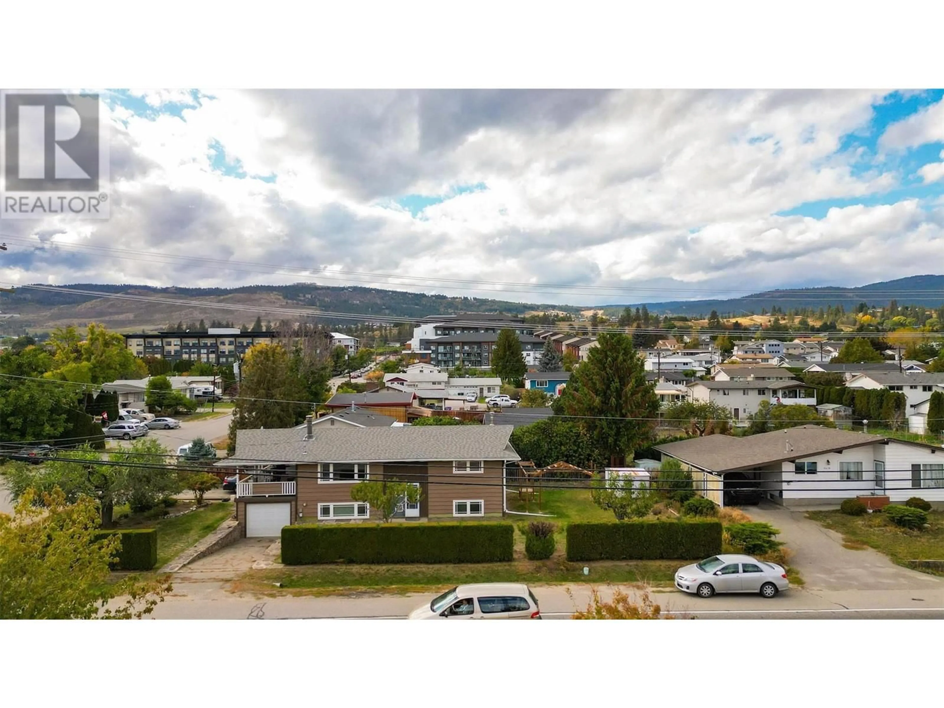 A pic from outside/outdoor area/front of a property/back of a property/a pic from drone, mountain view for 209 - 3645 GOSSET ROAD, West Kelowna British Columbia V1Z4C9