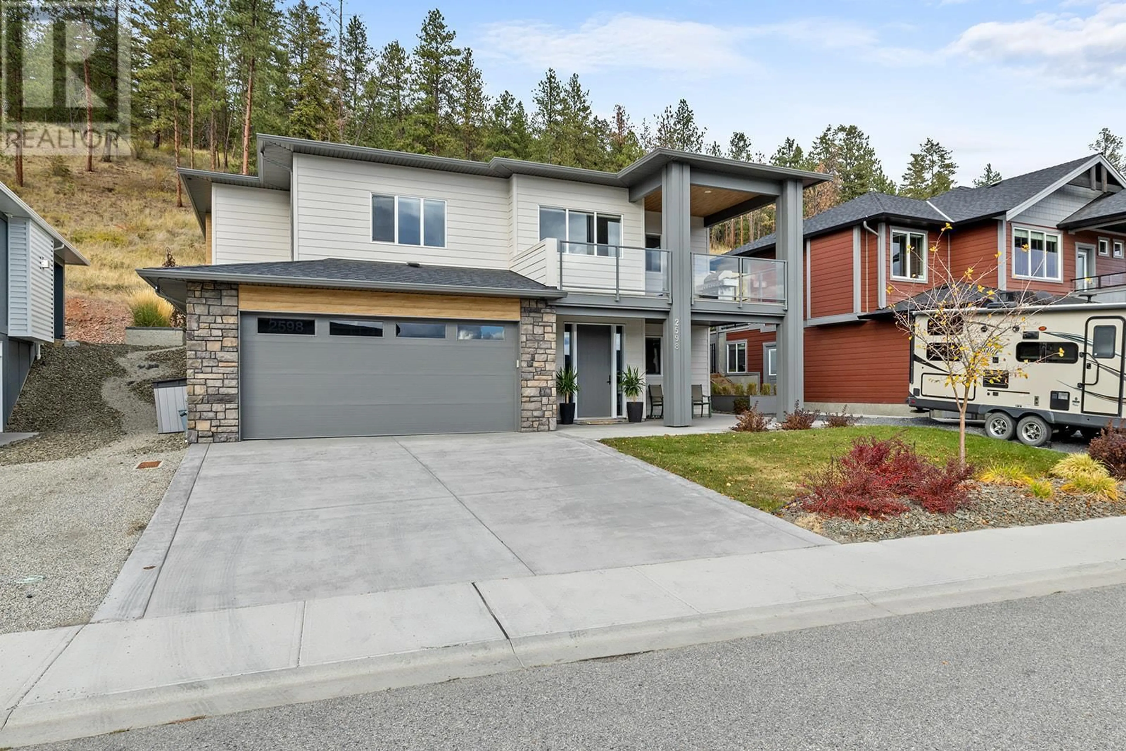 Frontside or backside of a home, the street view for 2598 Crown Crest Drive, West Kelowna British Columbia V4T3N3