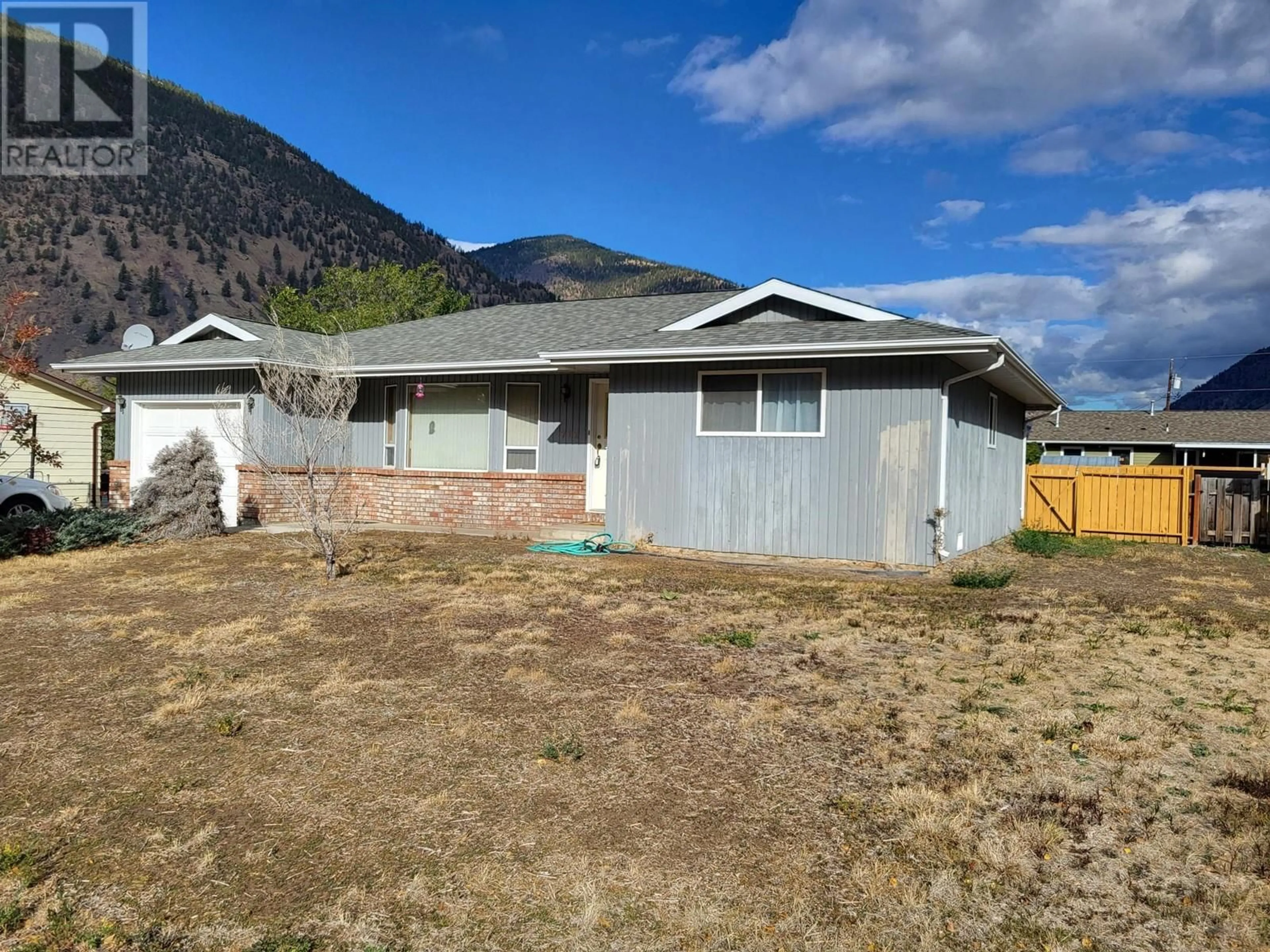 Frontside or backside of a home, the front or back of building for 712 Kickbush Avenue, Keremeos British Columbia V0X1N2