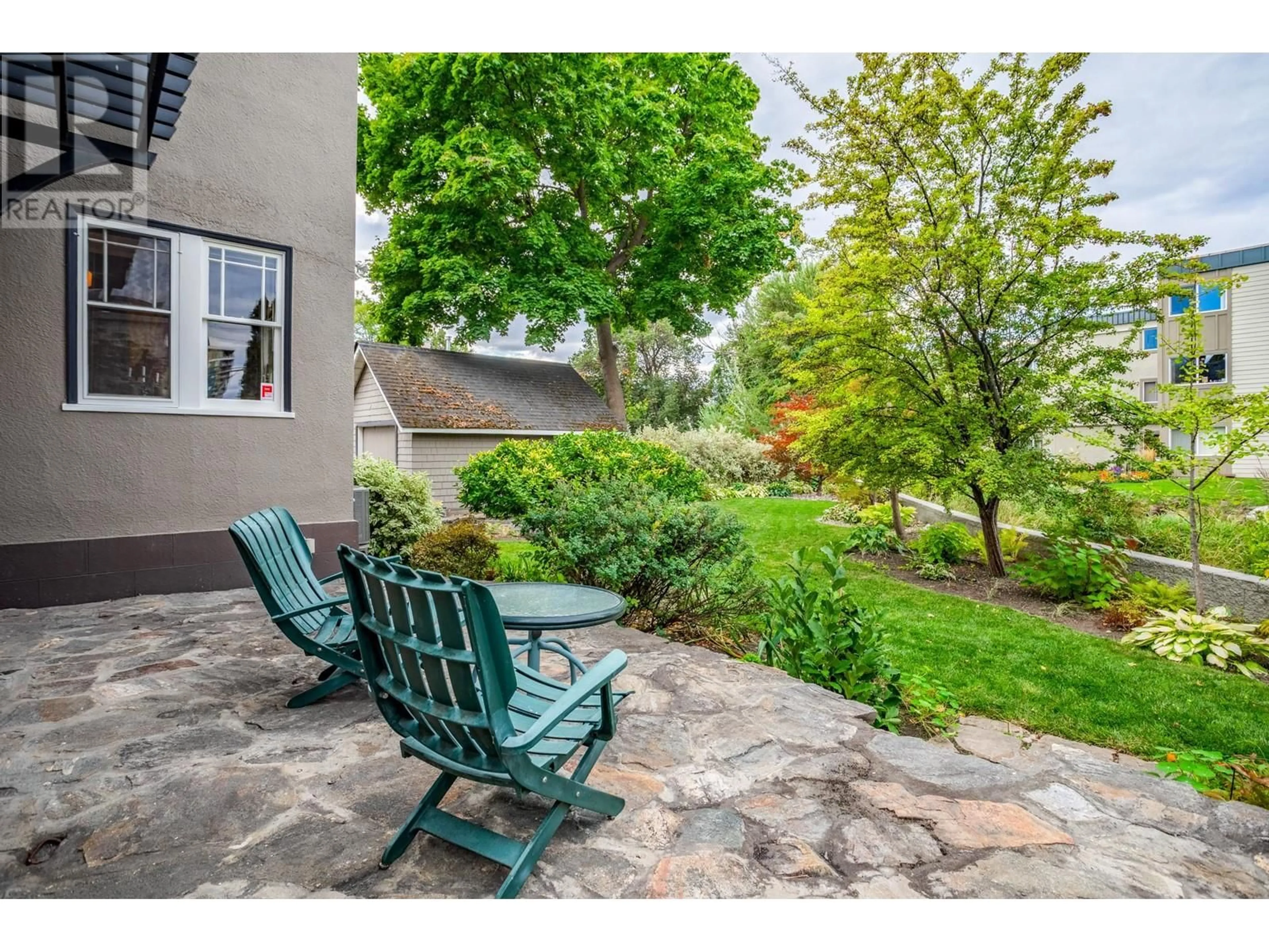 Patio, the fenced backyard for 1812 Marshall Street, Kelowna British Columbia V1Y2B7