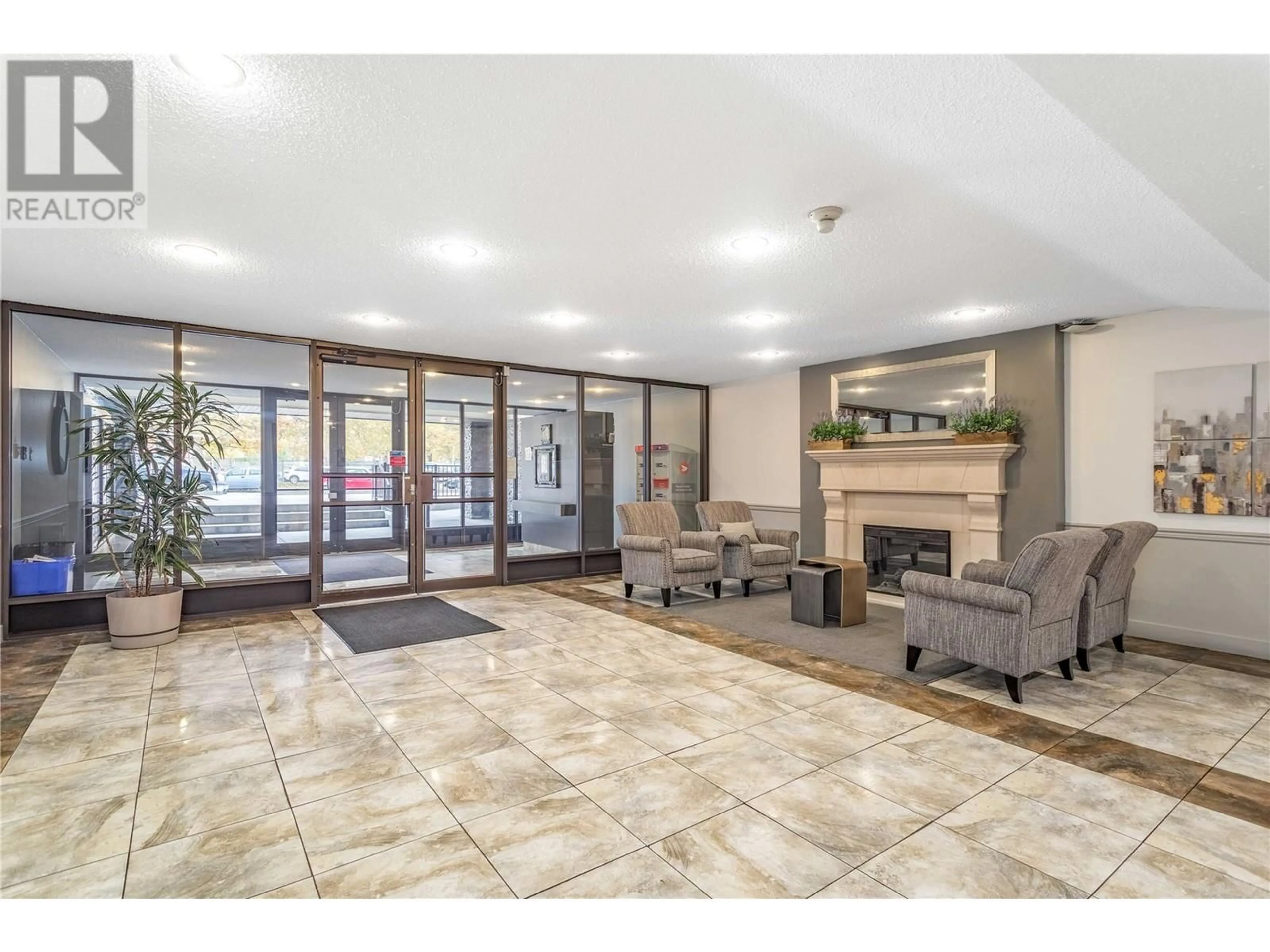 Indoor lobby, carpet floors for 737 Leon Avenue Unit# 1401, Kelowna British Columbia V1Y8L6