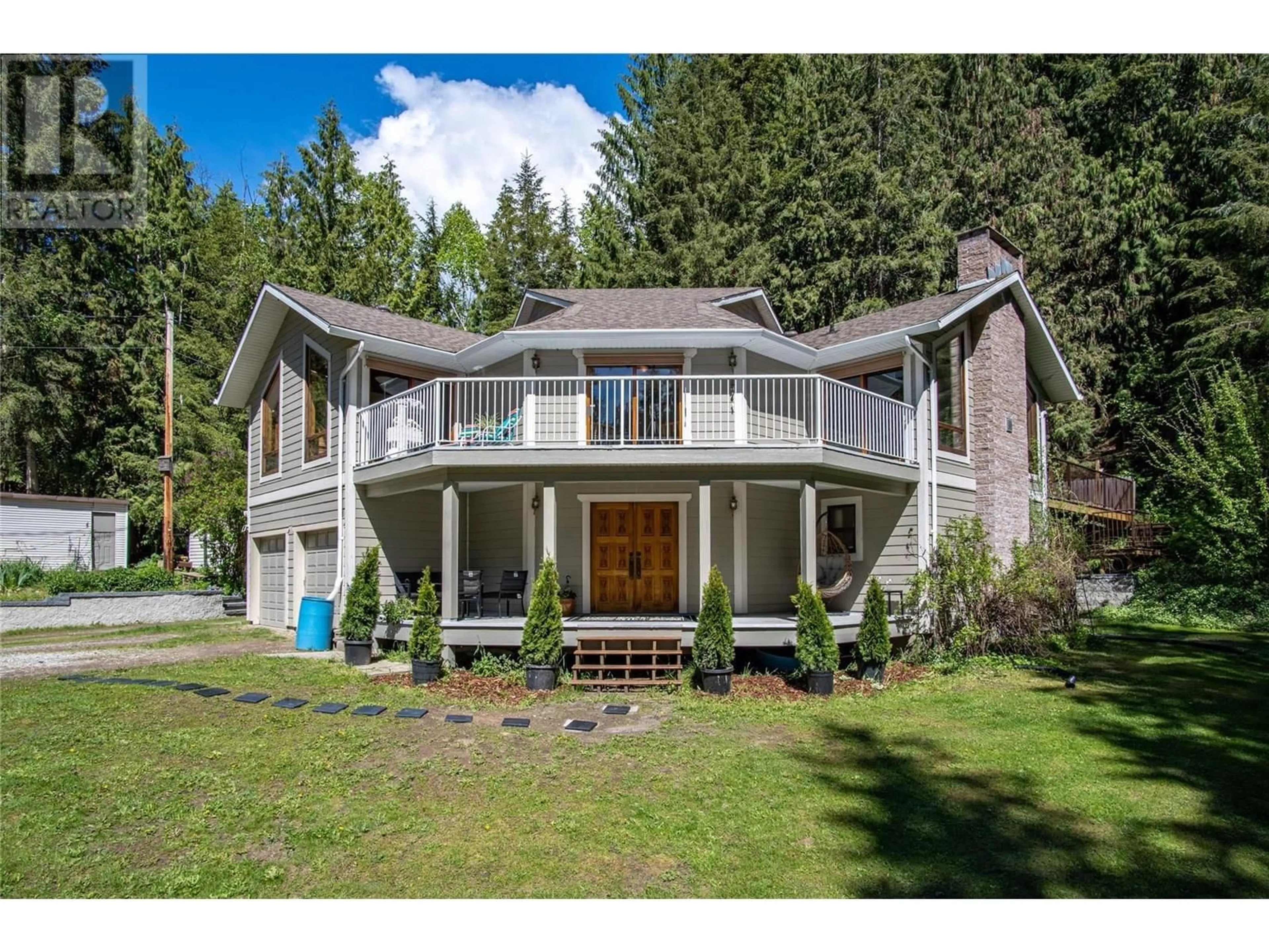 A pic from outside/outdoor area/front of a property/back of a property/a pic from drone, mountain view for 7905 97A HIGHWAY, Mara British Columbia V0E2K0