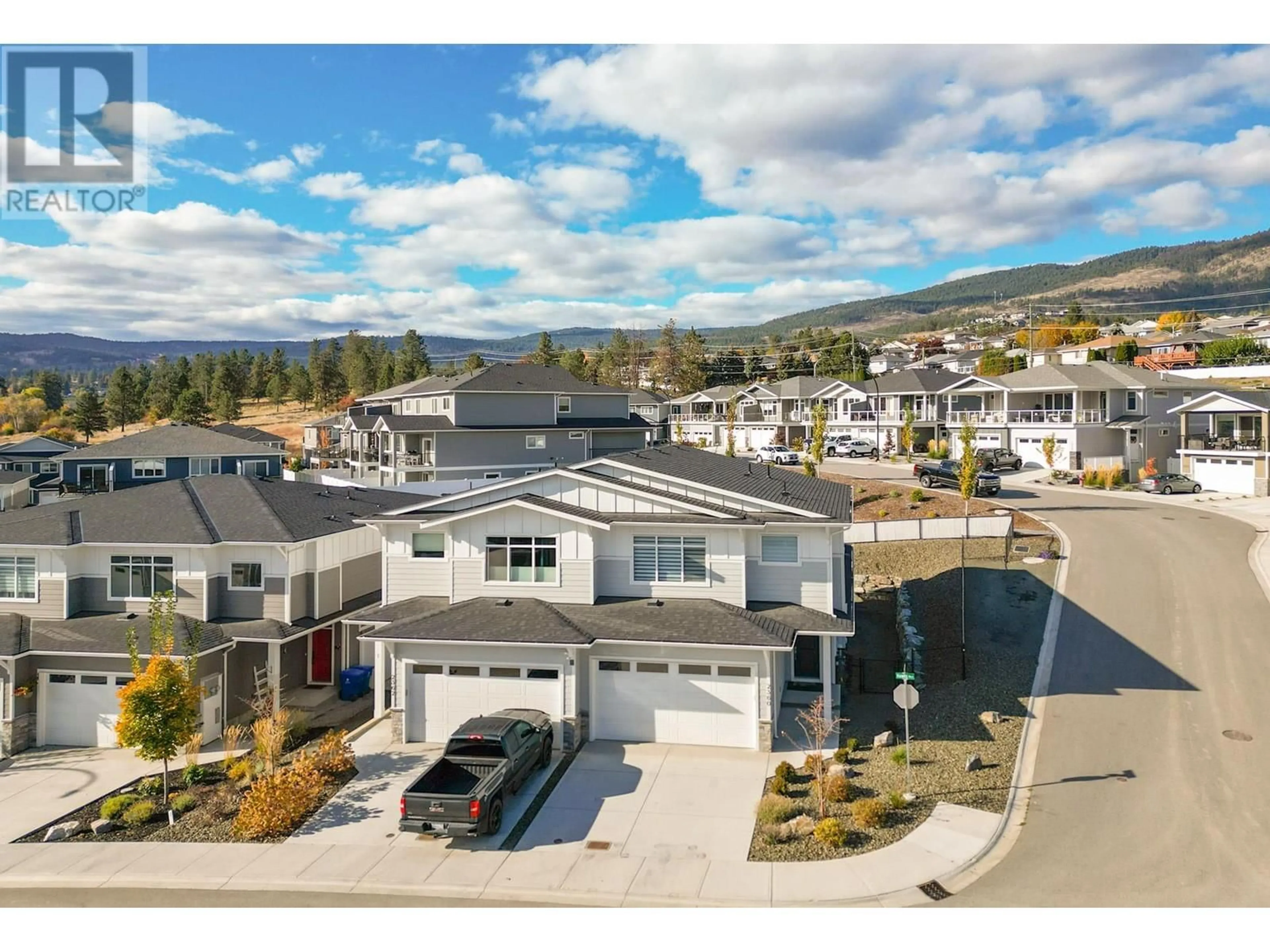 A pic from exterior of the house or condo, the street view for 2360 Hawks Boulevard, West Kelowna British Columbia V4T0A7