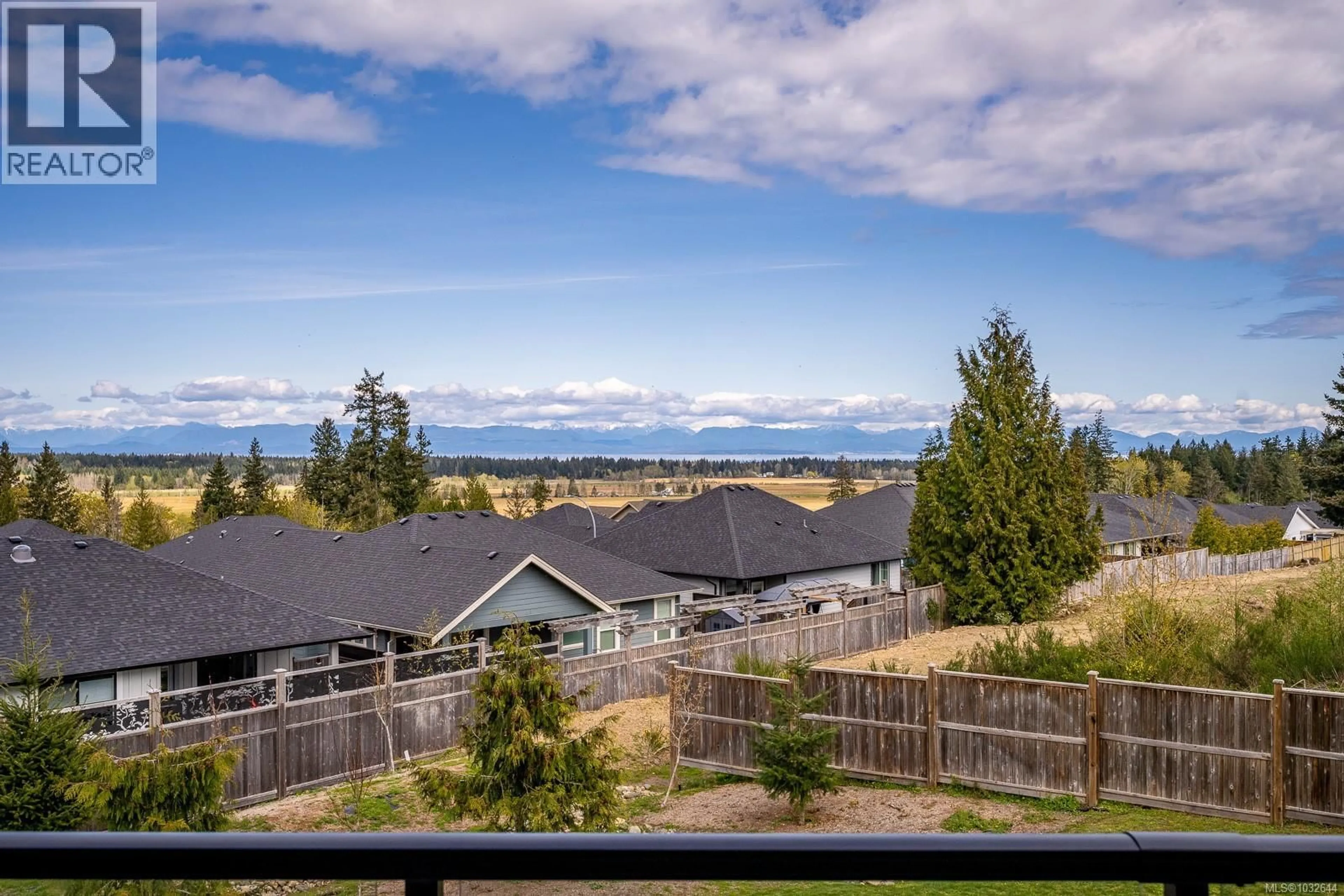 A pic from outside/outdoor area/front of a property/back of a property/a pic from drone, water/lake/river/ocean view for 23 - 623 CROWN ISLE BOULEVARD, Courtenay British Columbia V9N9W1