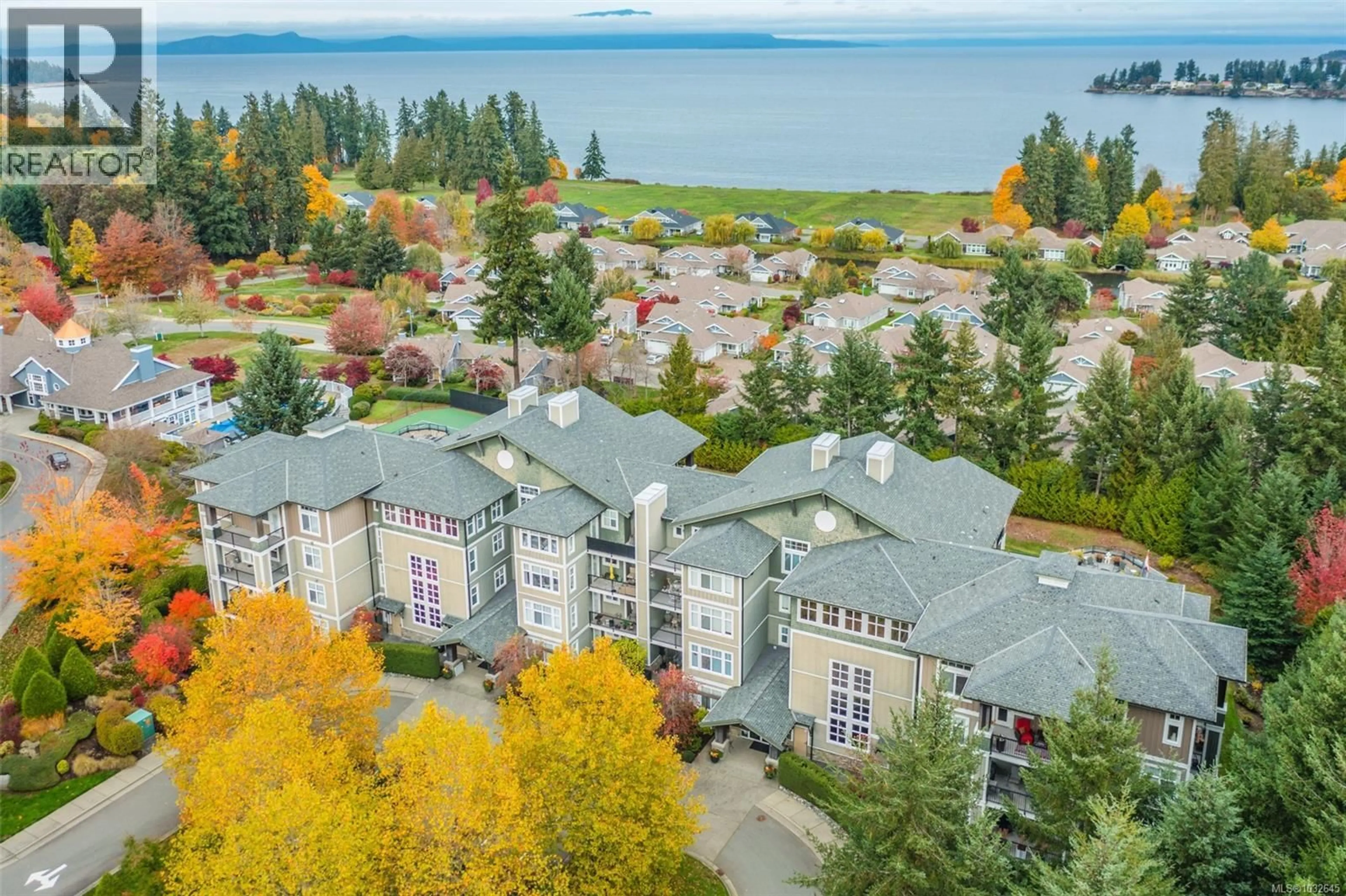 A pic from outside/outdoor area/front of a property/back of a property/a pic from drone, water/lake/river/ocean view for 101 - 1325 CAPE COD DRIVE, Parksville British Columbia V9P2Y8