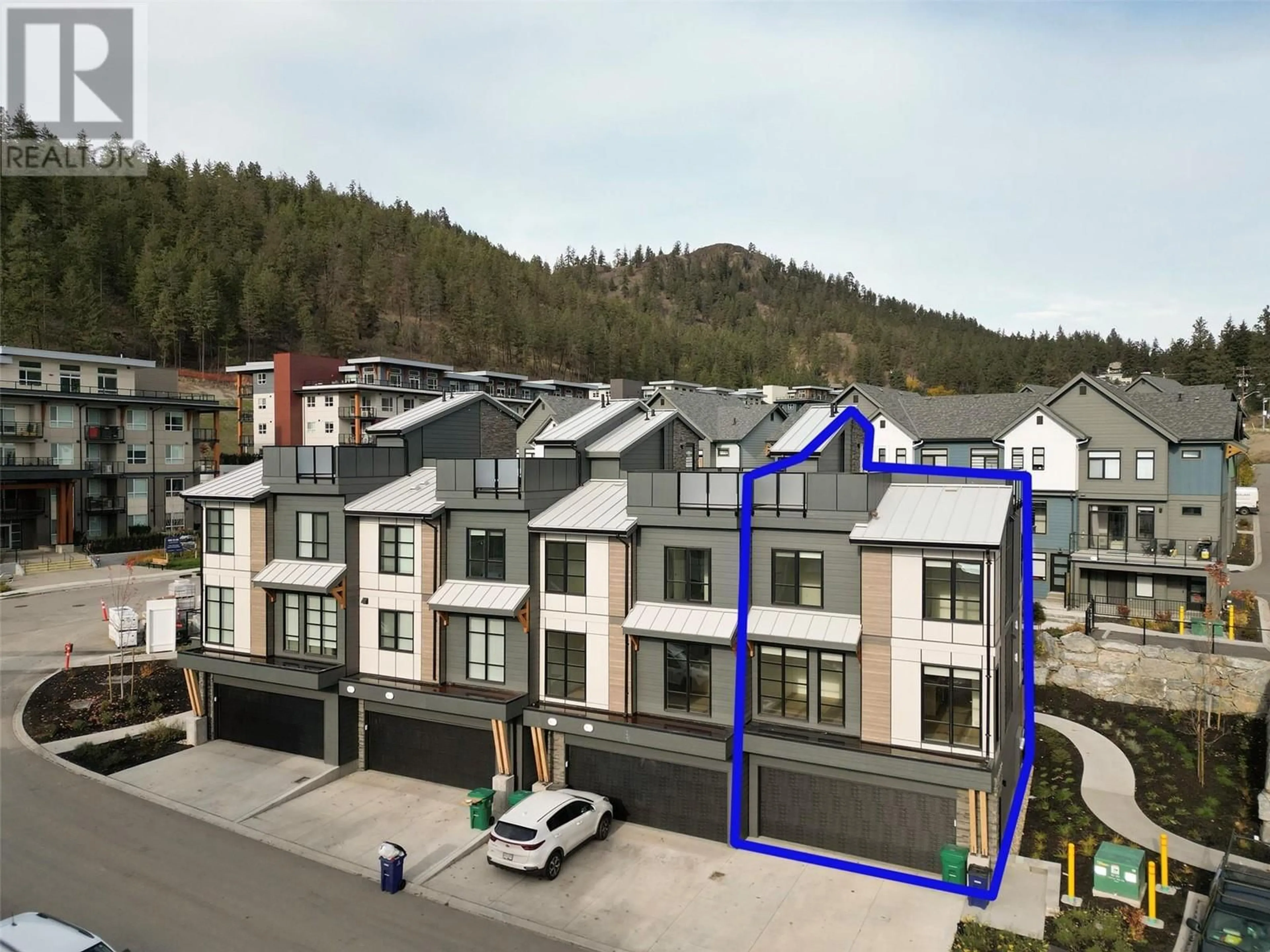 A pic from exterior of the house or condo, the street view for 1455 Cara Glen Court Court Unit# 104, Kelowna British Columbia V1V2J1