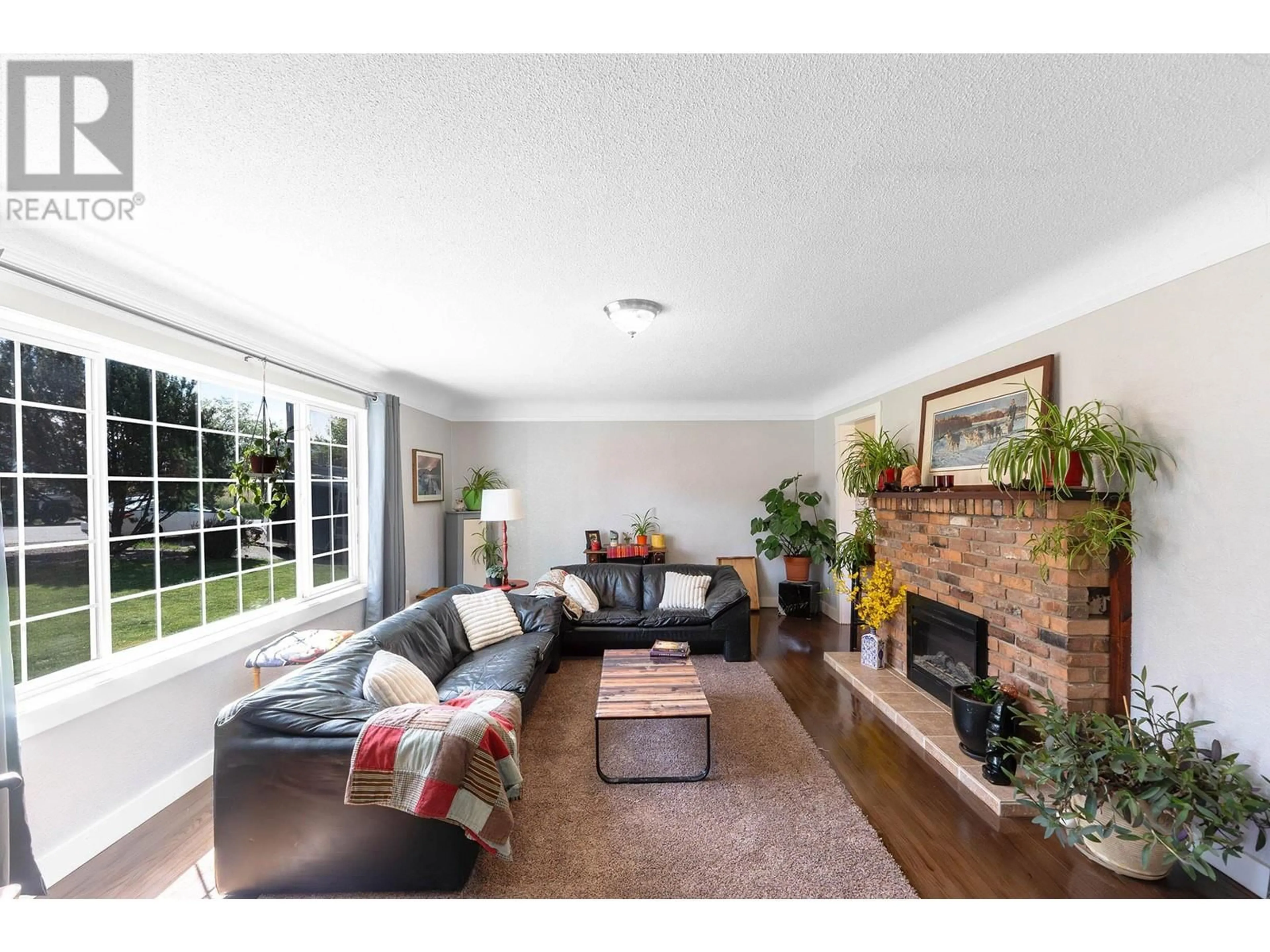 Living room, wood floors for 3766 Wetton Road, West Kelowna British Columbia V4T2C1