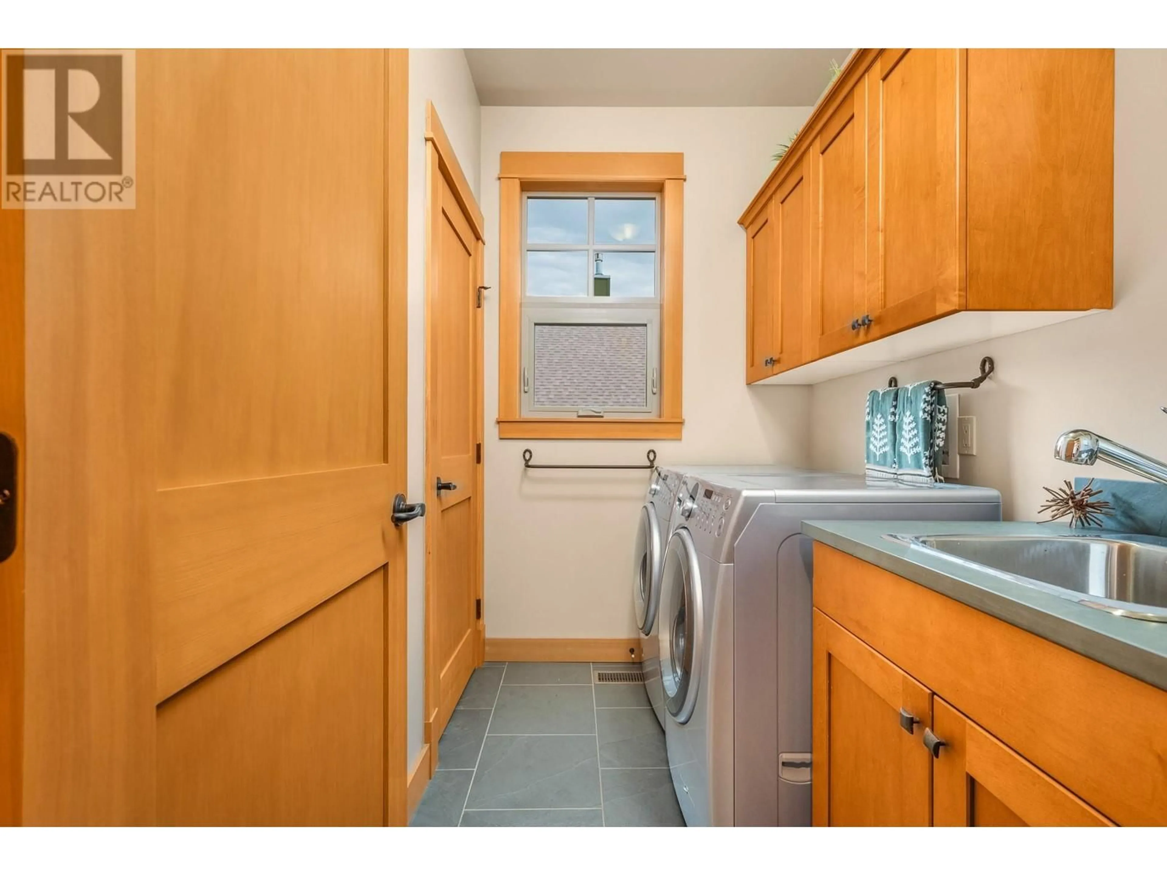 Laundry room for 9887 Cathedral Drive, Silver Star British Columbia V1B3M1