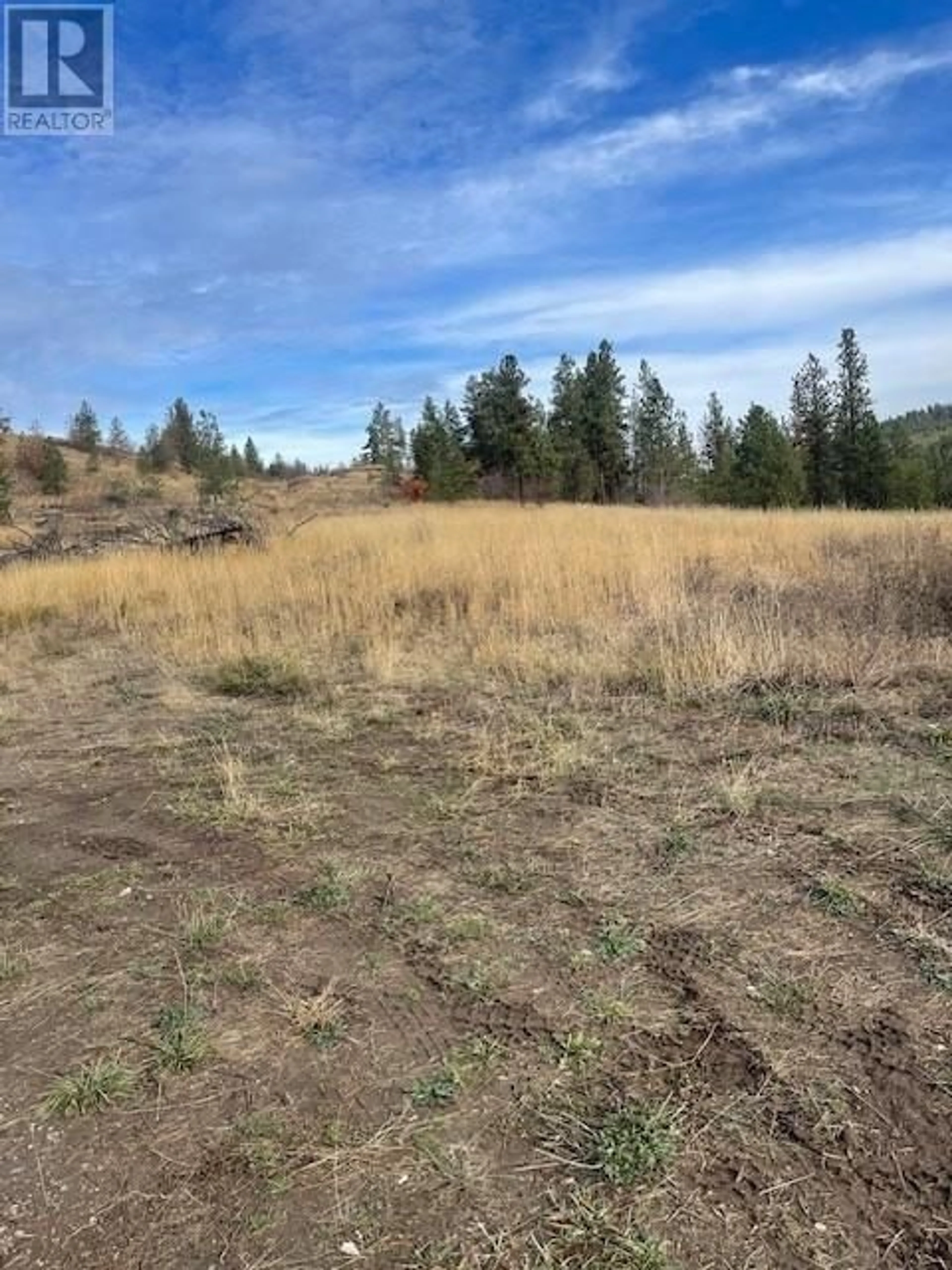 Open concept kitchen, wood/laminate floor for 2670 GLENMORE ROAD NORTH, Kelowna British Columbia V1V2B6