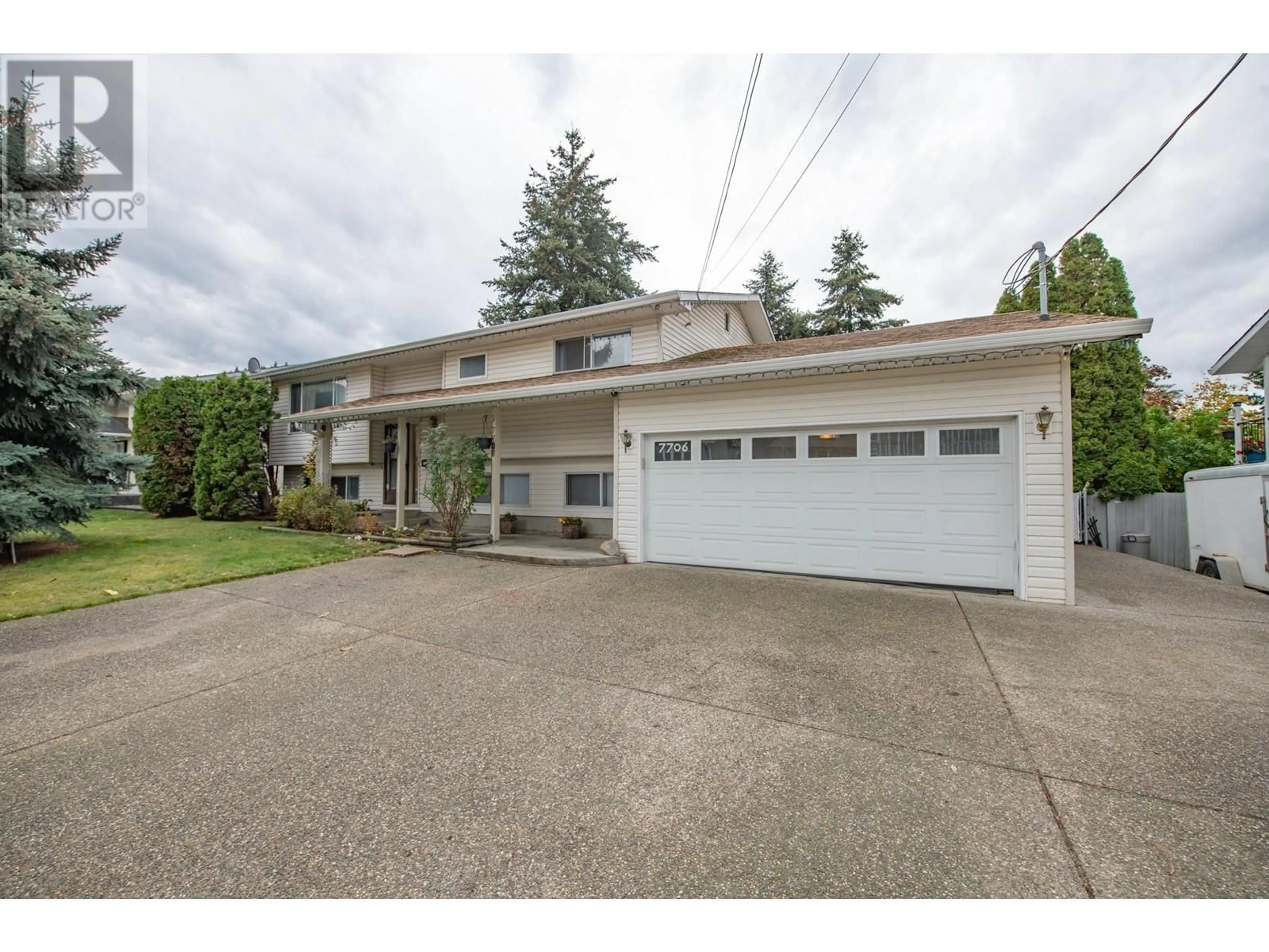 Frontside or backside of a home, the street view for 7706 Giles Drive, Coldstream British Columbia V1B1G5