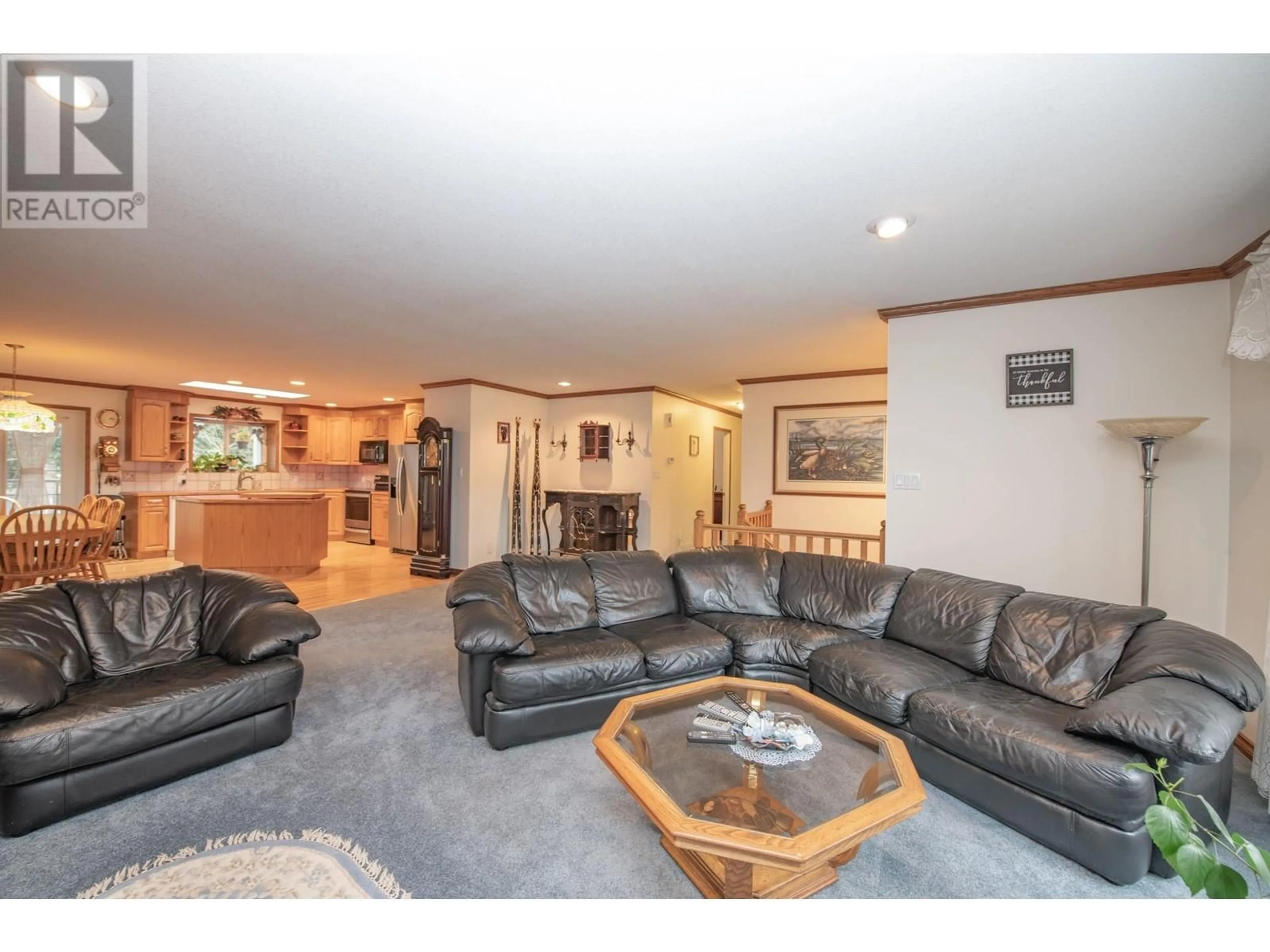 Living room, wood floors for 7706 Giles Drive, Coldstream British Columbia V1B1G5