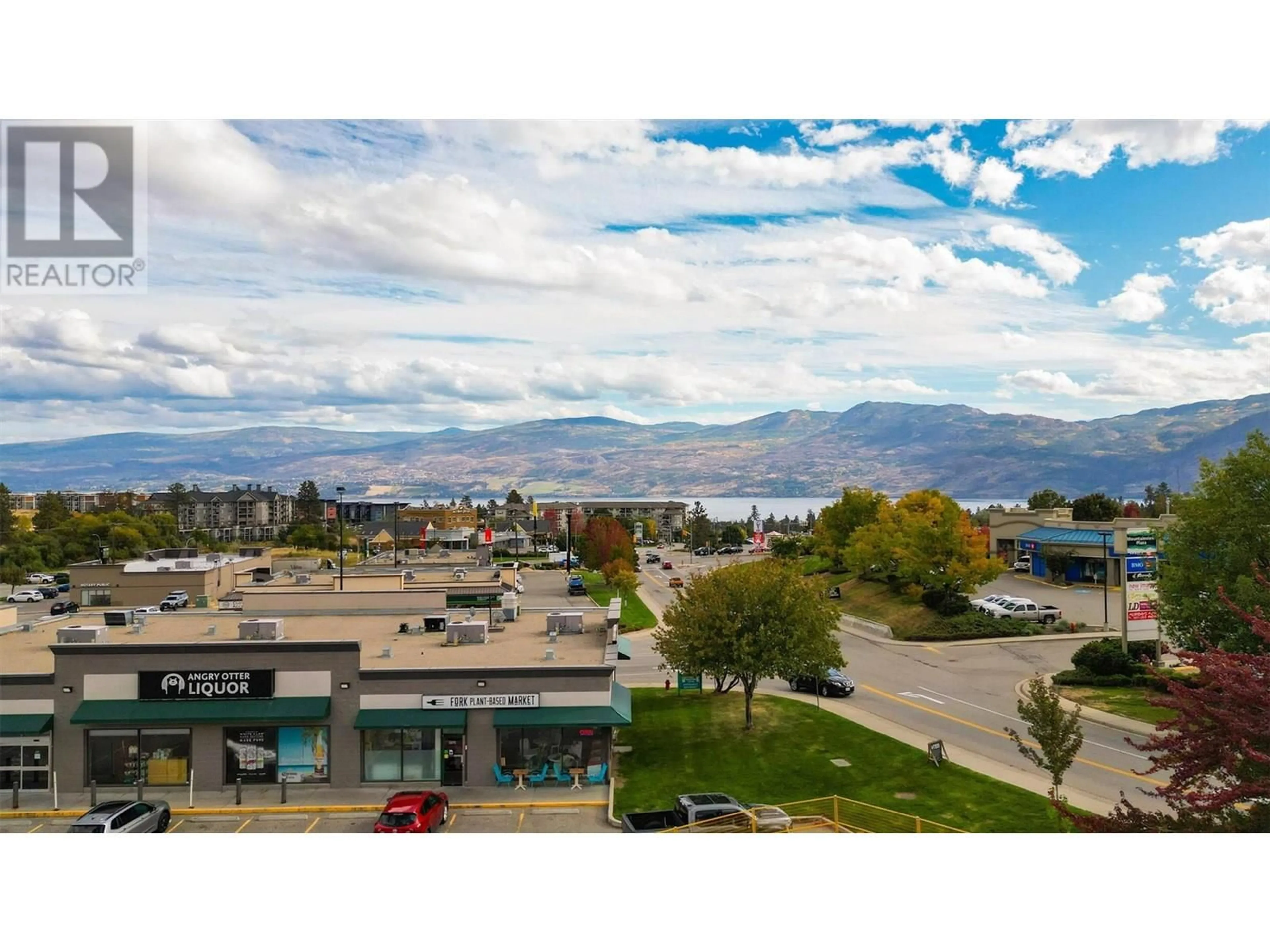 A pic from outside/outdoor area/front of a property/back of a property/a pic from drone, mountain view for 301 - 3645 GOSSET ROAD, West Kelowna British Columbia V1Z4C9
