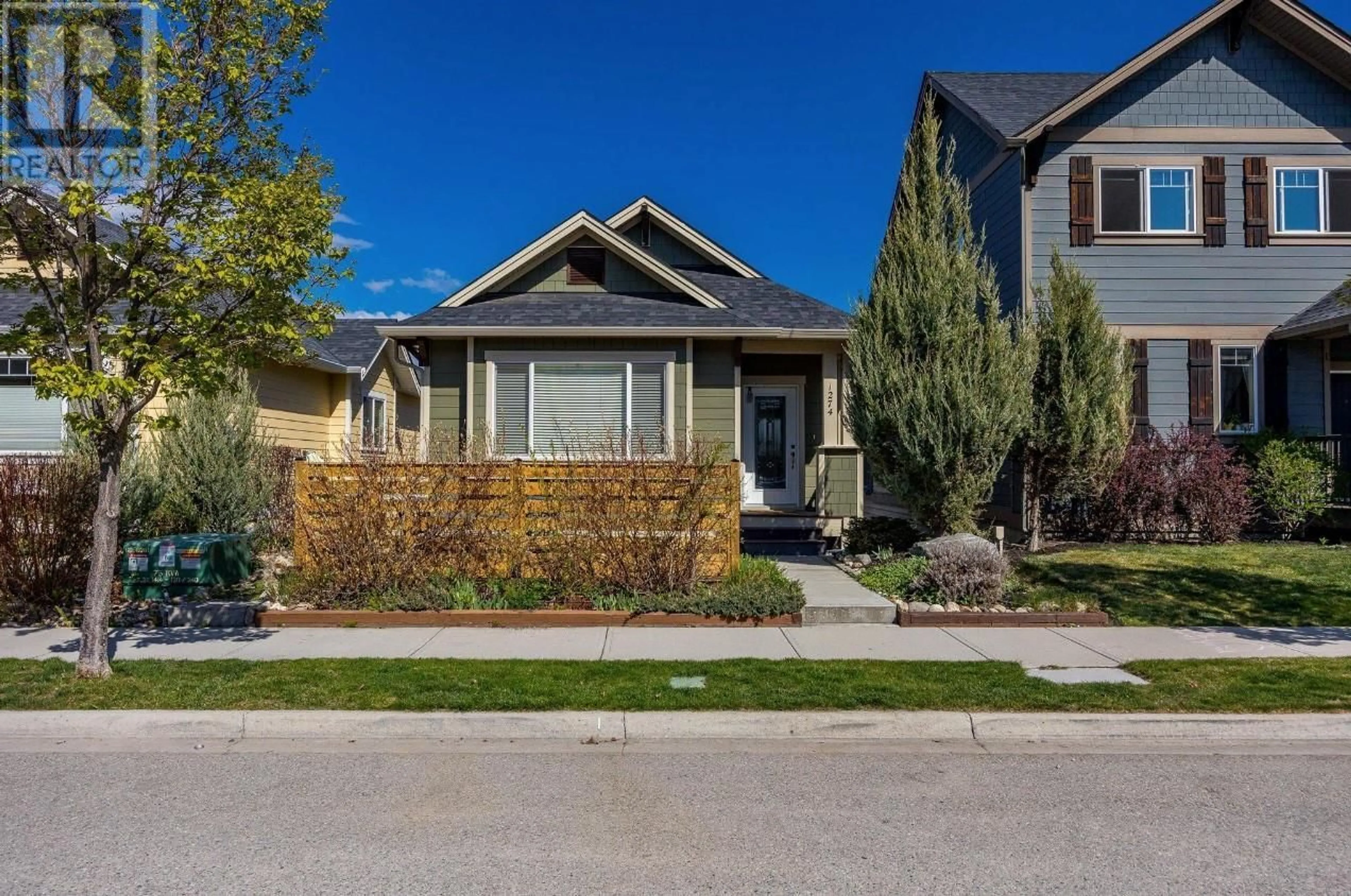 Frontside or backside of a home, the street view for 1274 Bergamot Avenue, Kelowna British Columbia V1W5K5