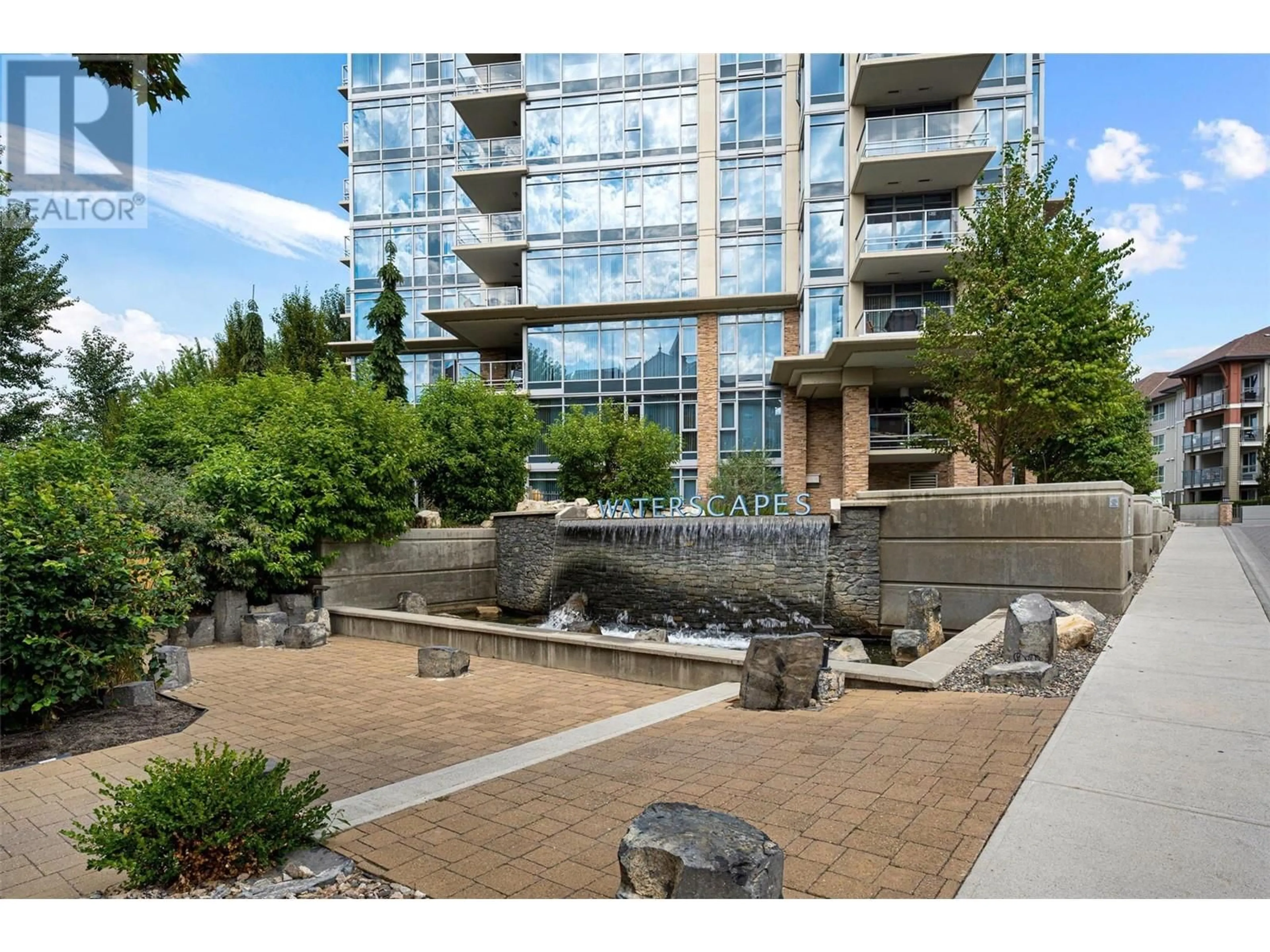 A pic from exterior of the house or condo, the street view for 1075 Sunset Drive Unit# 505, Kelowna British Columbia V1Y9Y9