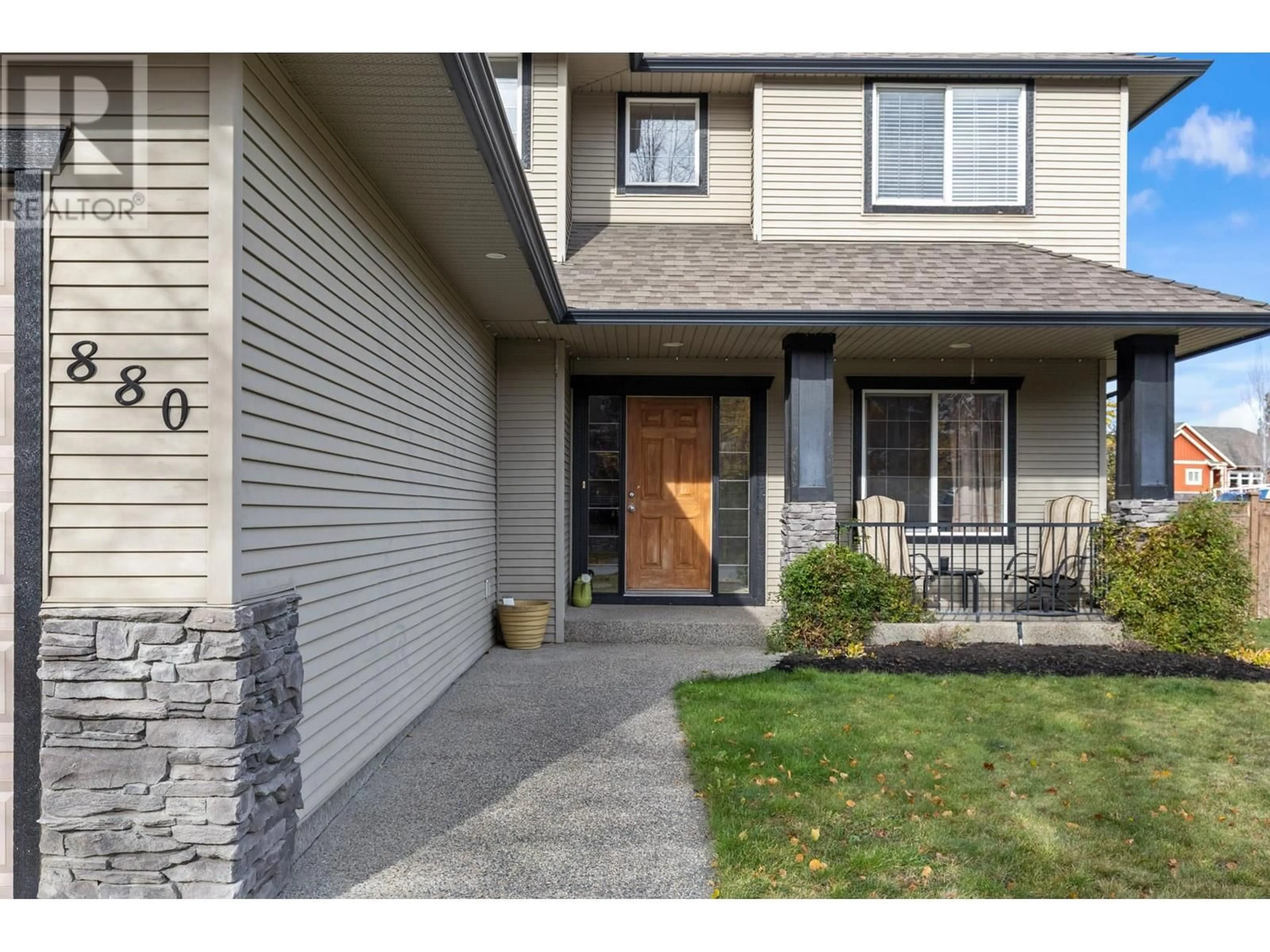 Frontside or backside of a home, the street view for 880 Arbor View Drive, Kelowna British Columbia V1W5B5