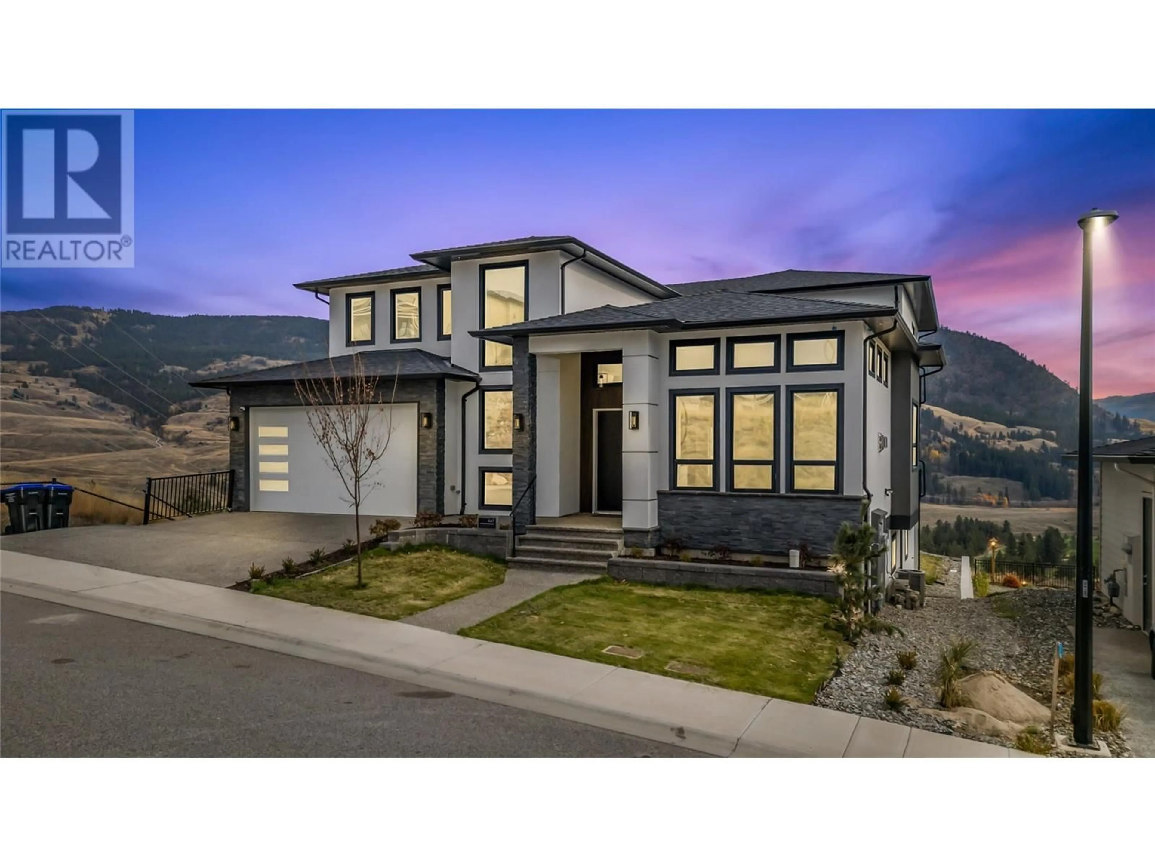 Frontside or backside of a home, mountain for 647 Carnoustie Drive, Kelowna British Columbia V1P1V2