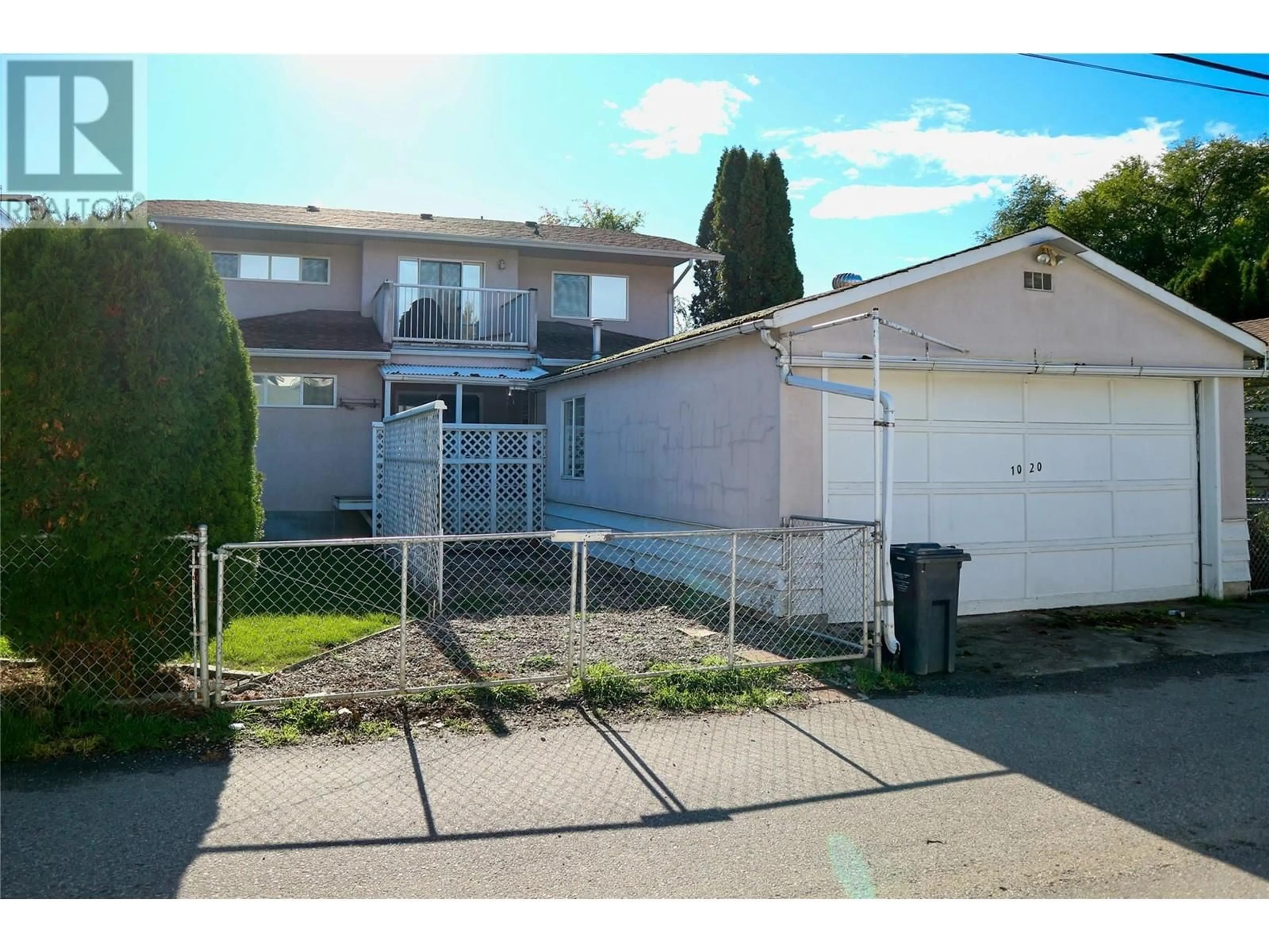 Frontside or backside of a home, the street view for 1020 Martin Avenue, Kelowna British Columbia V1Y6V5