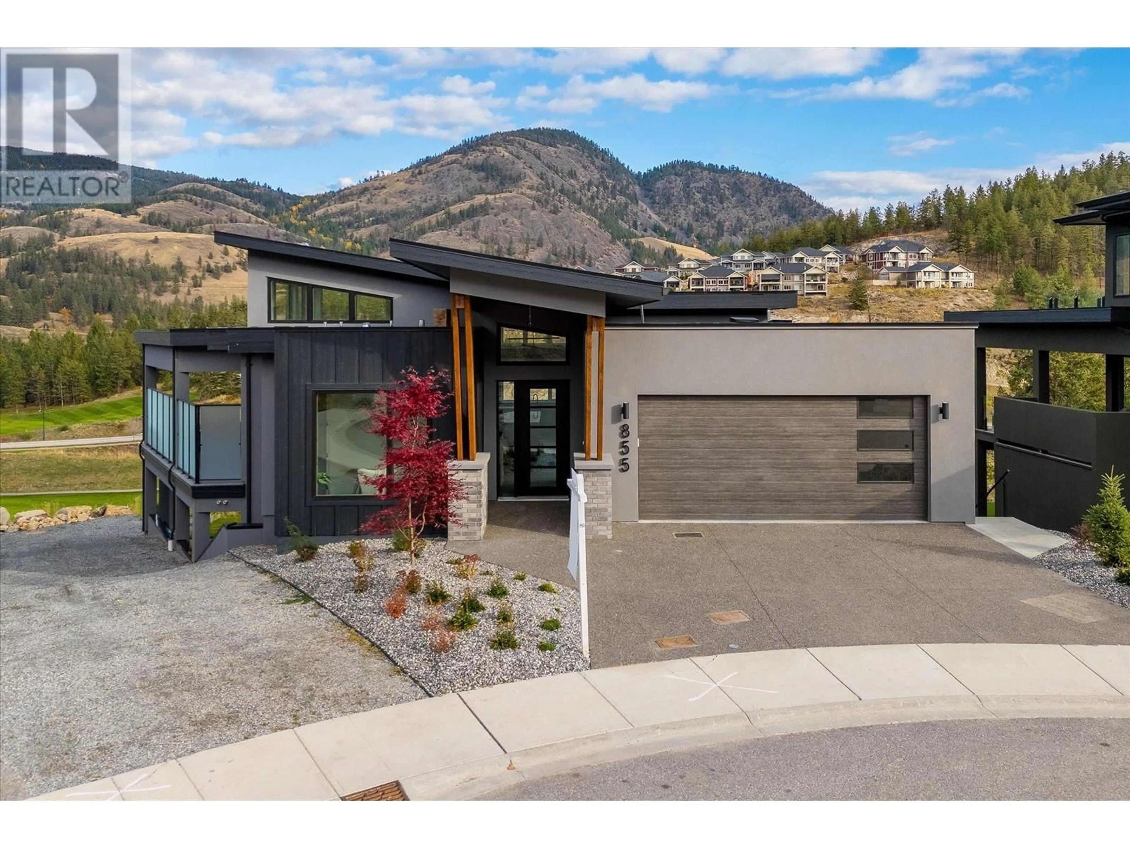 Frontside or backside of a home, mountain for 855 Lochness Street, Kelowna British Columbia V1P0A3