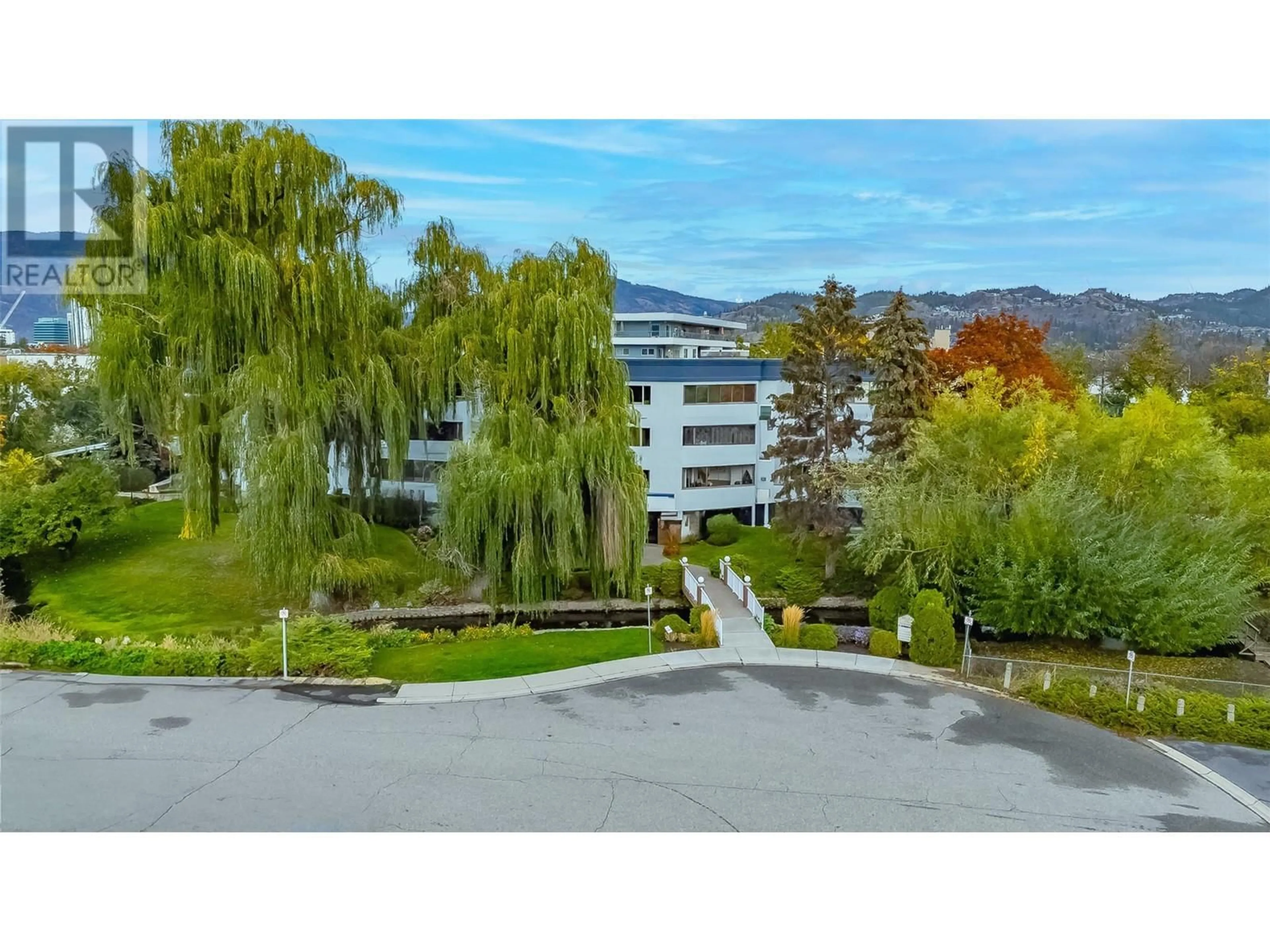 A pic from exterior of the house or condo, the street view for 1170 Brookside Avenue Unit# 108, Kelowna British Columbia V1Y5T4