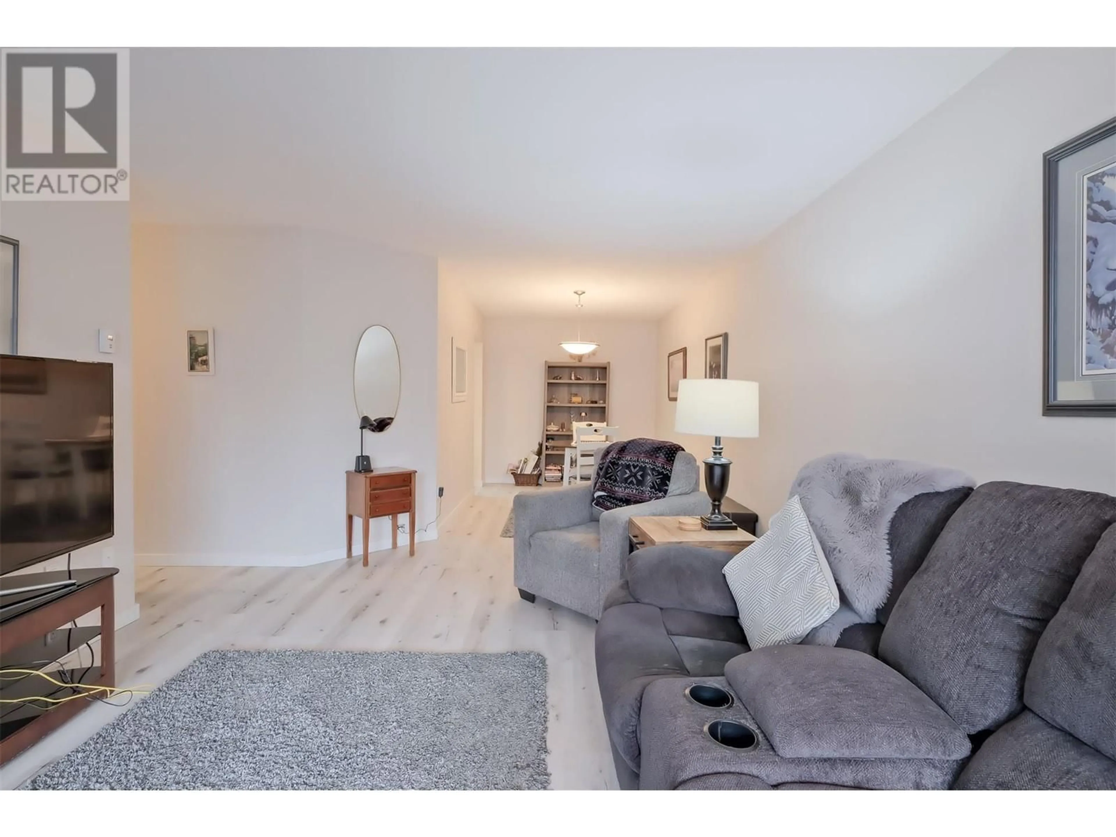 Living room, wood floors for 1170 Brookside Avenue Unit# 108, Kelowna British Columbia V1Y5T4