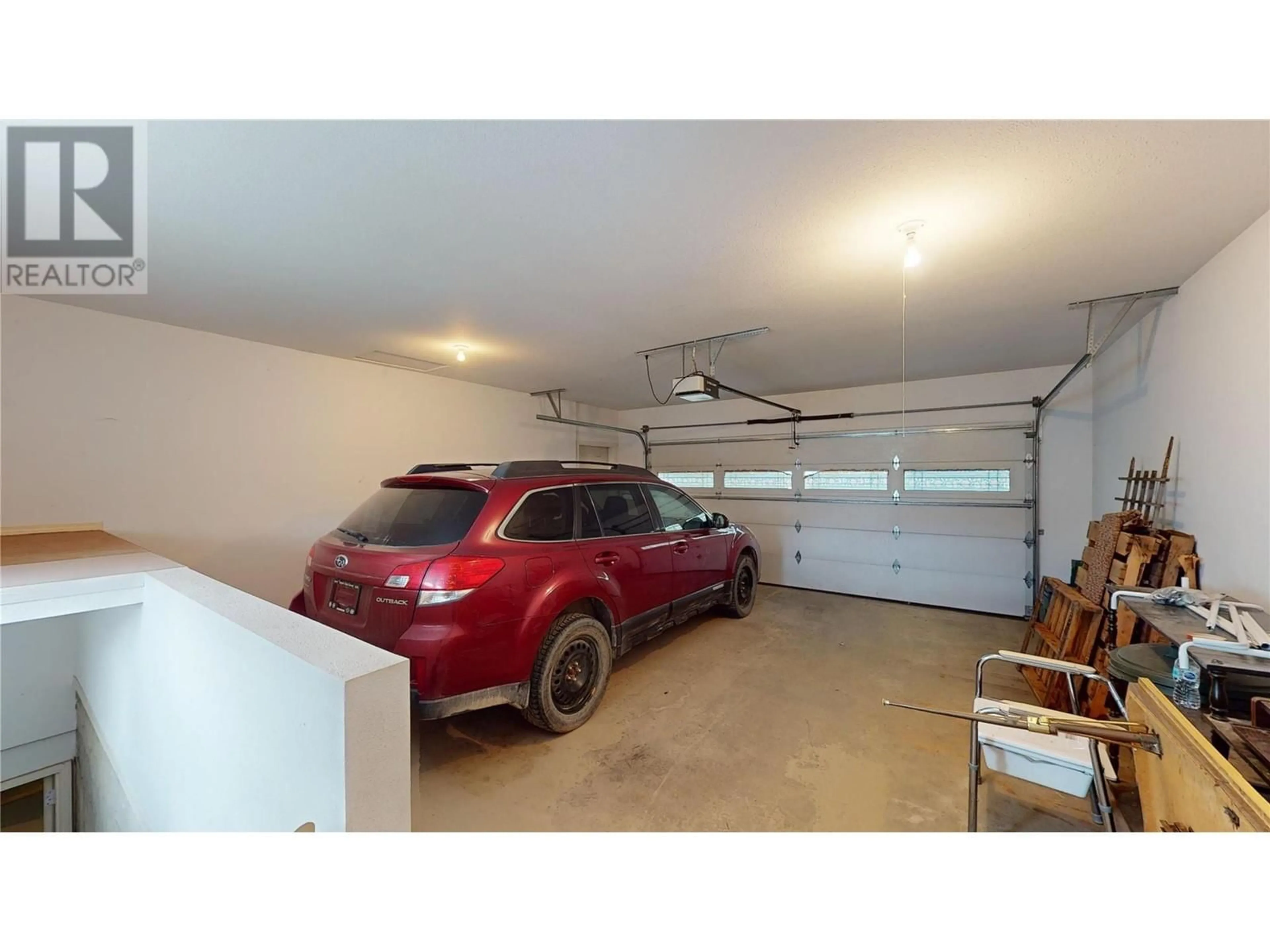 Indoor garage, cement floor for 2375 1ST Street Unit# 15, Cranbrook British Columbia V1C6J7