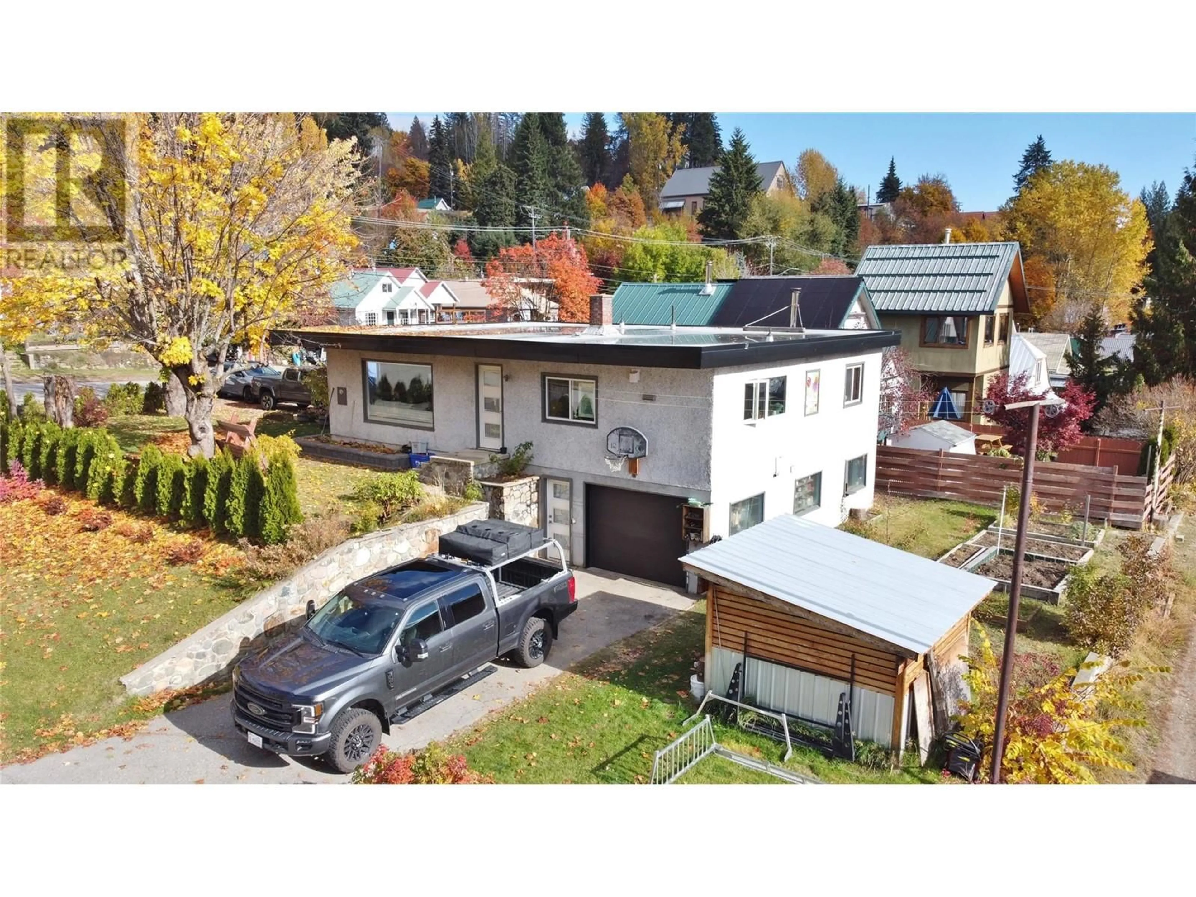 A pic from outside/outdoor area/front of a property/back of a property/a pic from drone, street for 1613 LEROI AVENUE, Rossland British Columbia V0G1Y0