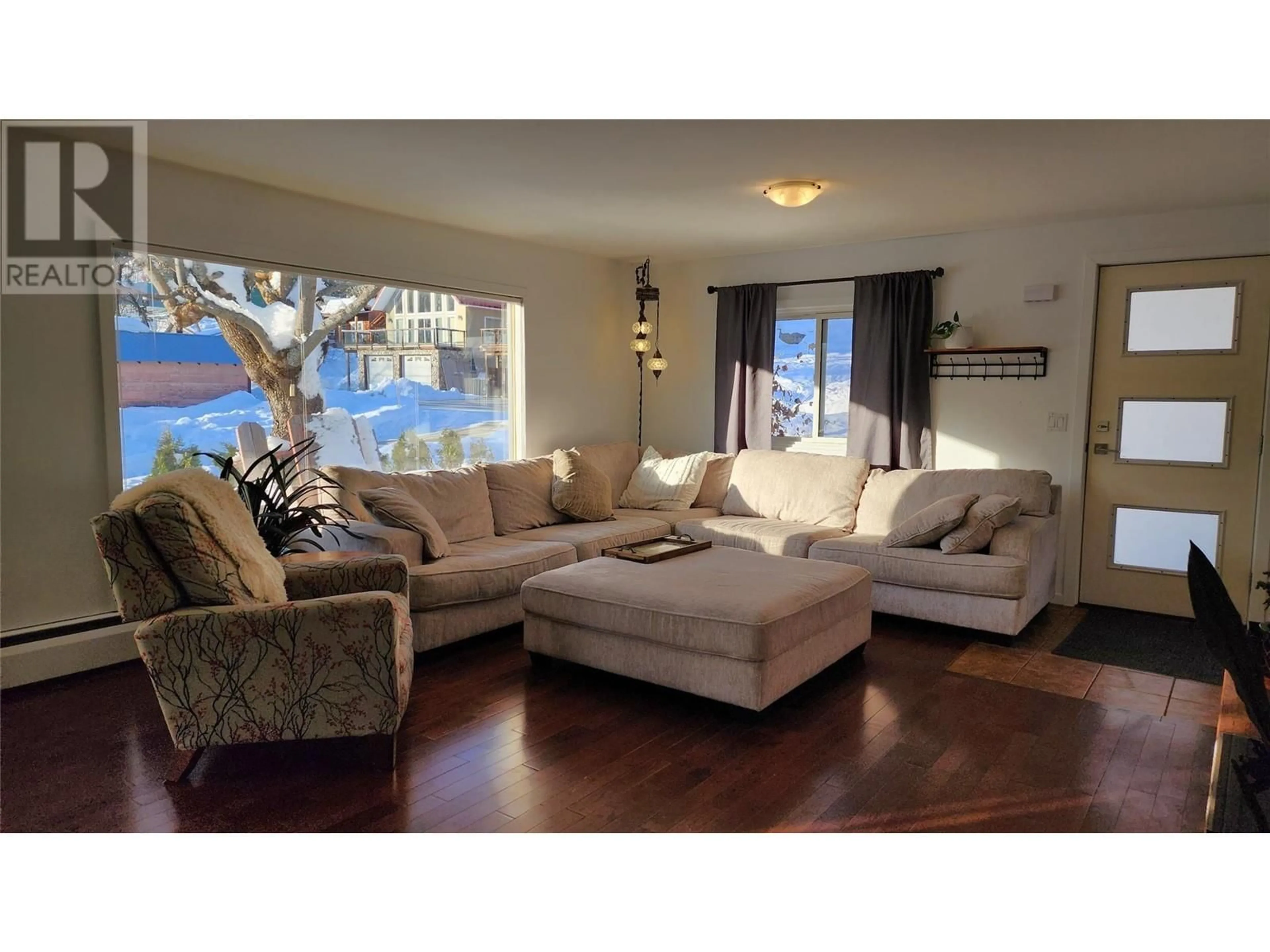 Living room with furniture, wood/laminate floor for 1613 LEROI AVENUE, Rossland British Columbia V0G1Y0