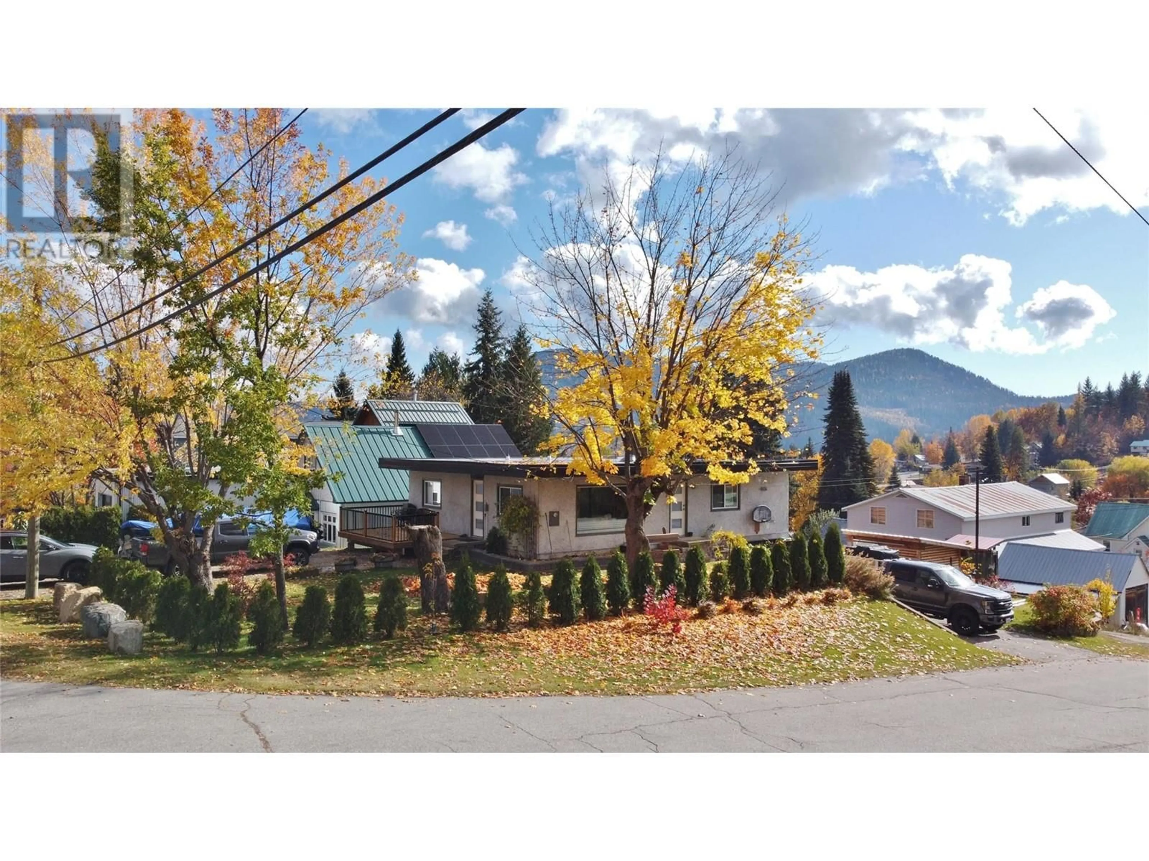 Frontside or backside of a home, the street view for 1613 LeRoi Avenue, Rossland British Columbia V0G1Y0