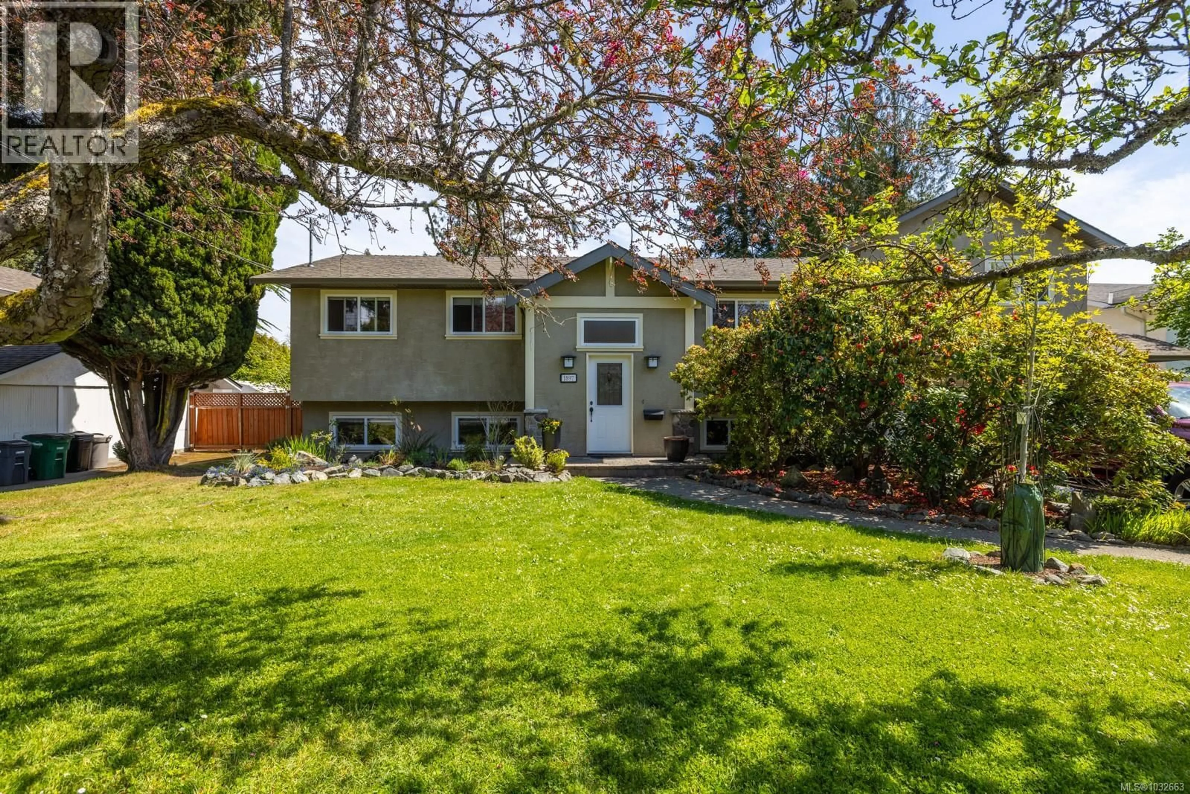 Home with vinyl exterior material, street for 1897 SAN PEDRO AVENUE, Saanich British Columbia V8N2G7