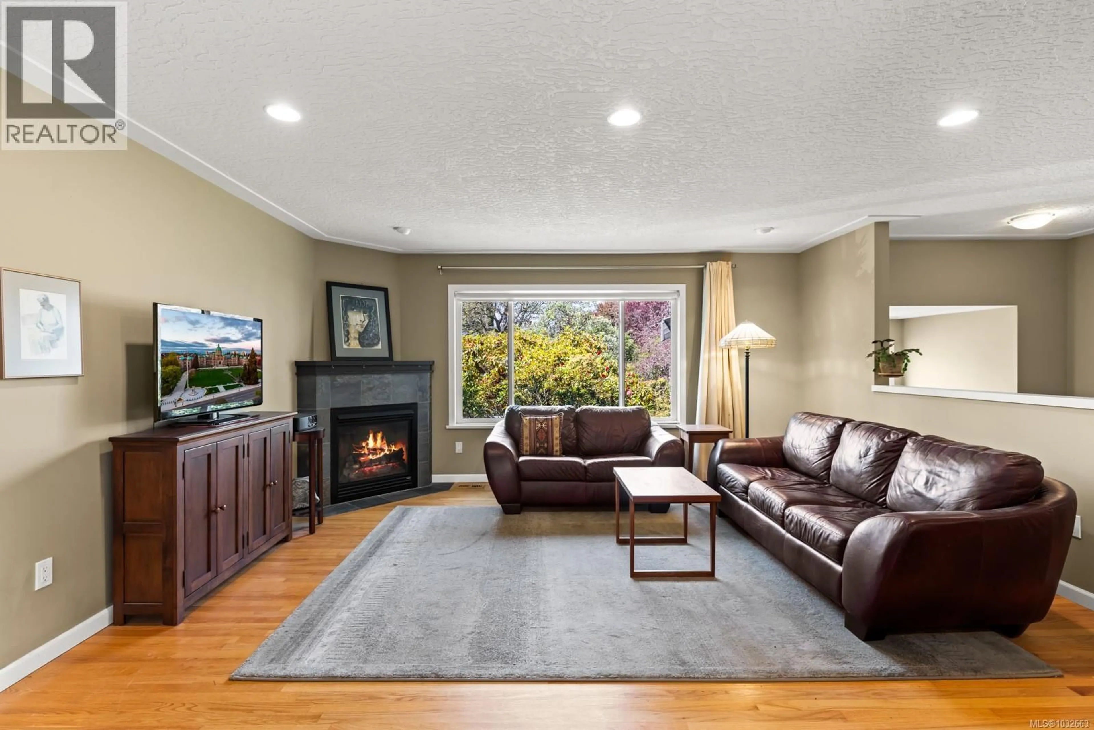 Living room with furniture, unknown for 1897 SAN PEDRO AVENUE, Saanich British Columbia V8N2G7
