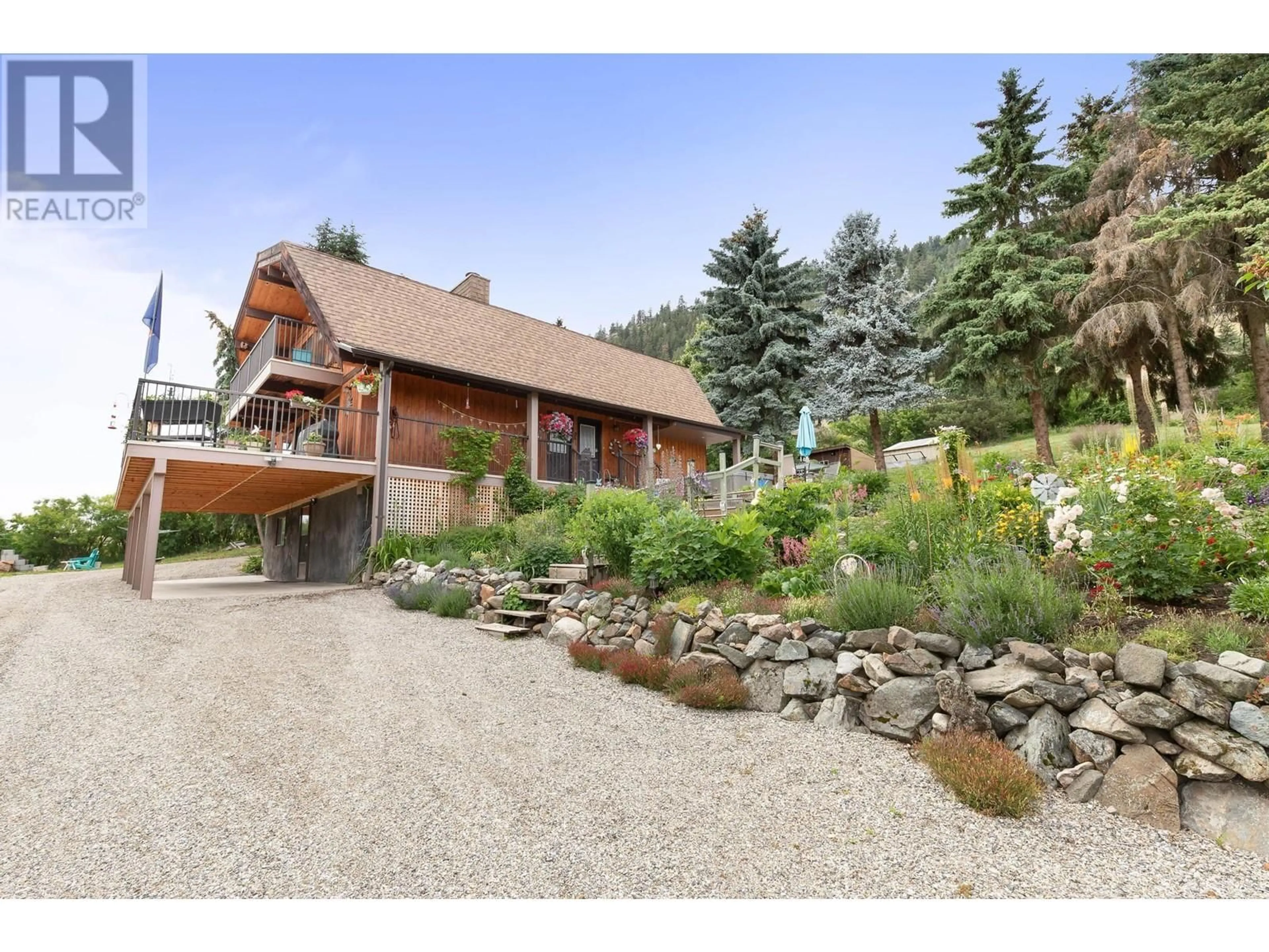 Frontside or backside of a home, cottage for 6721 Buchanan Road, Coldstream British Columbia V1B3C5