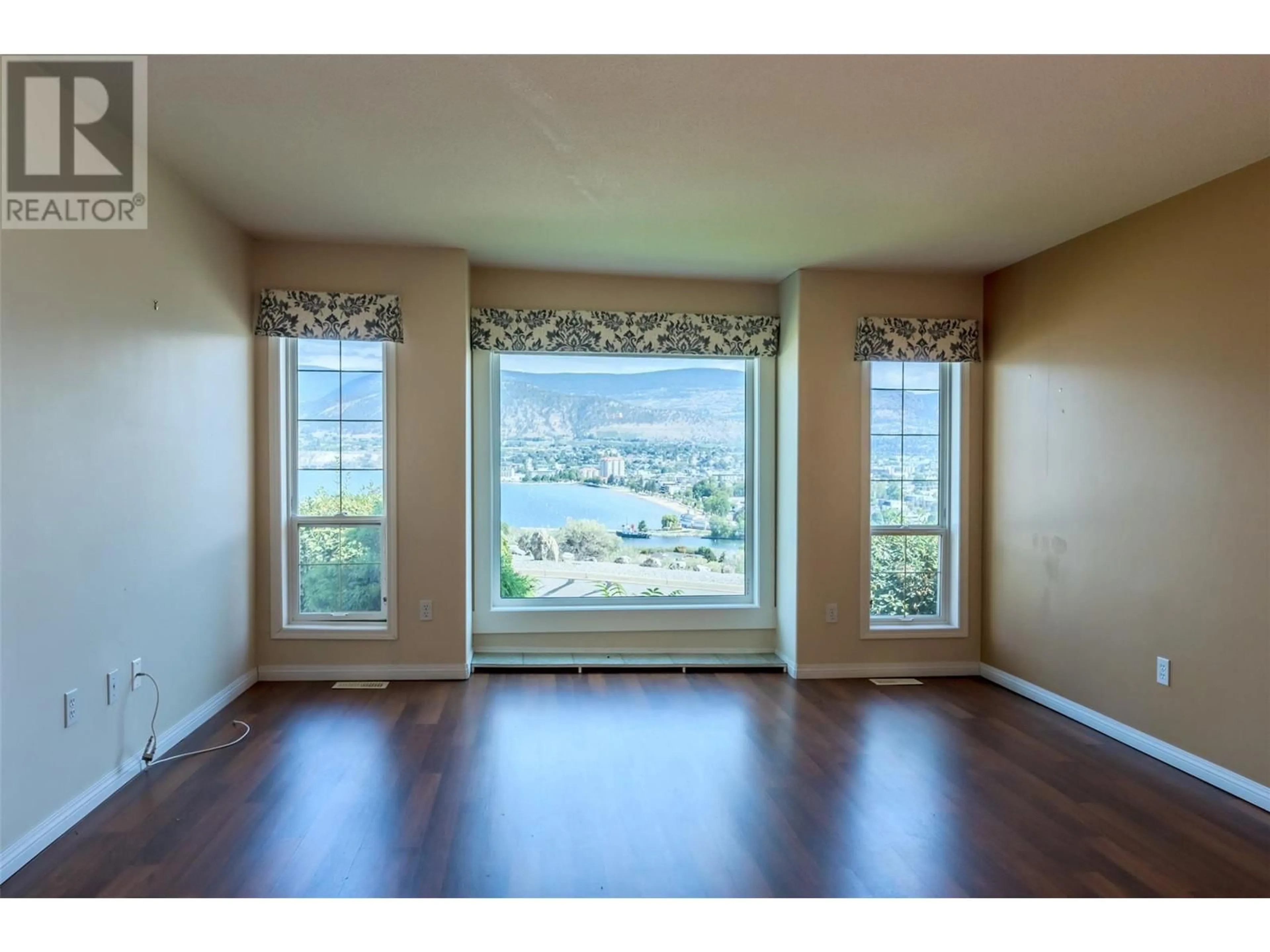 A pic of a room, wood floors for 418 Ridge Road, Penticton British Columbia V2A8N7