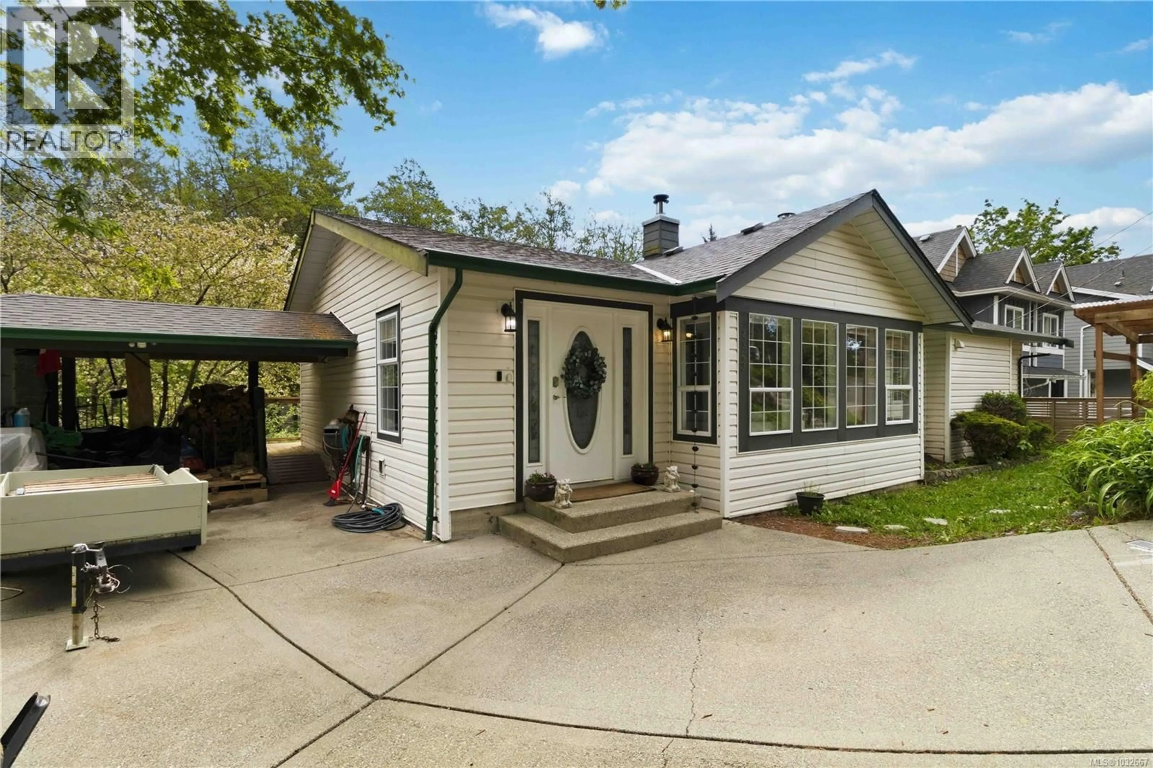 Home with vinyl exterior material, street for 2363 GALENA ROAD, Sooke British Columbia V9Z0M4