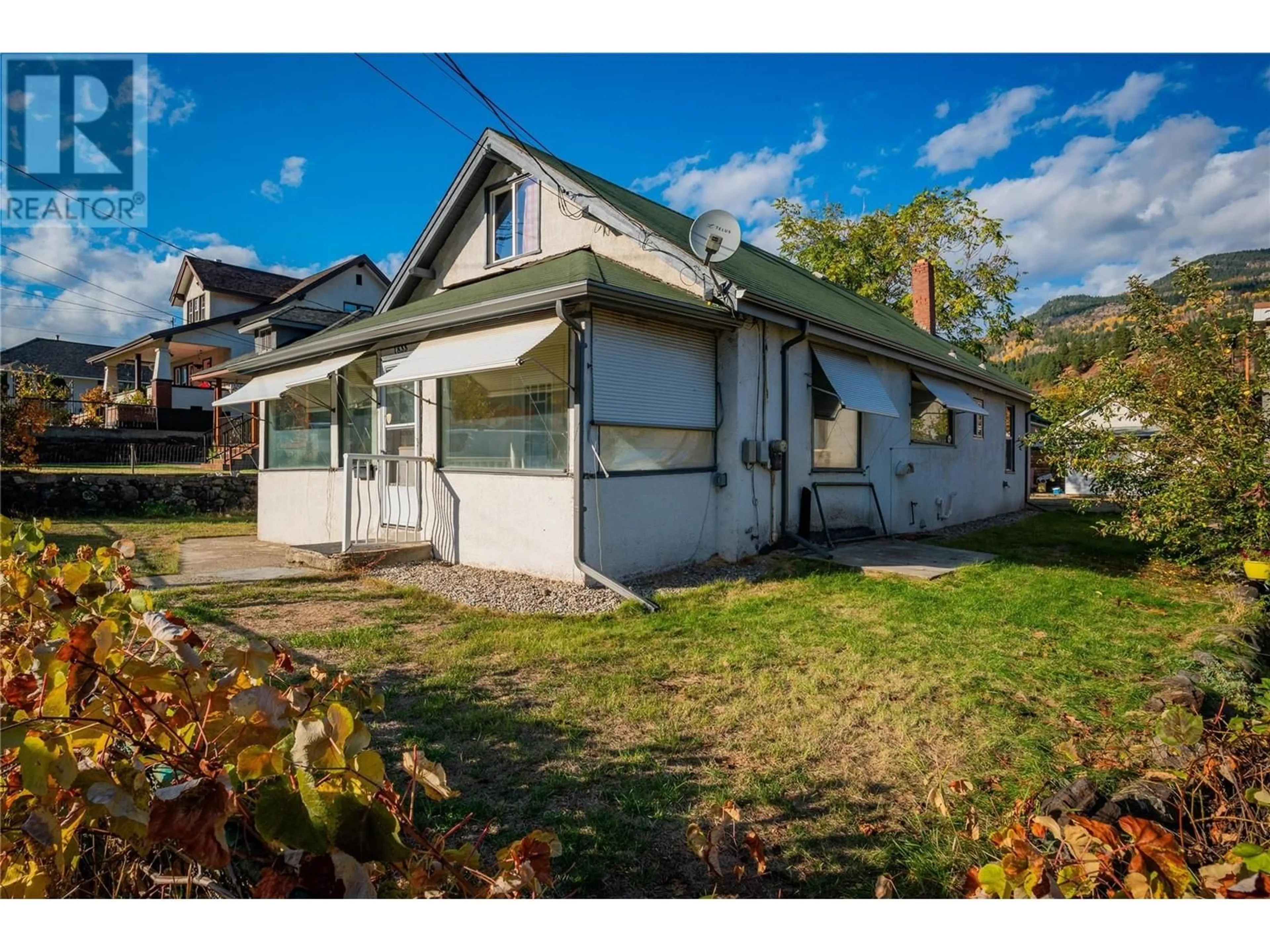 Frontside or backside of a home, cottage for 1833 Third Avenue, Trail British Columbia V1R1R2