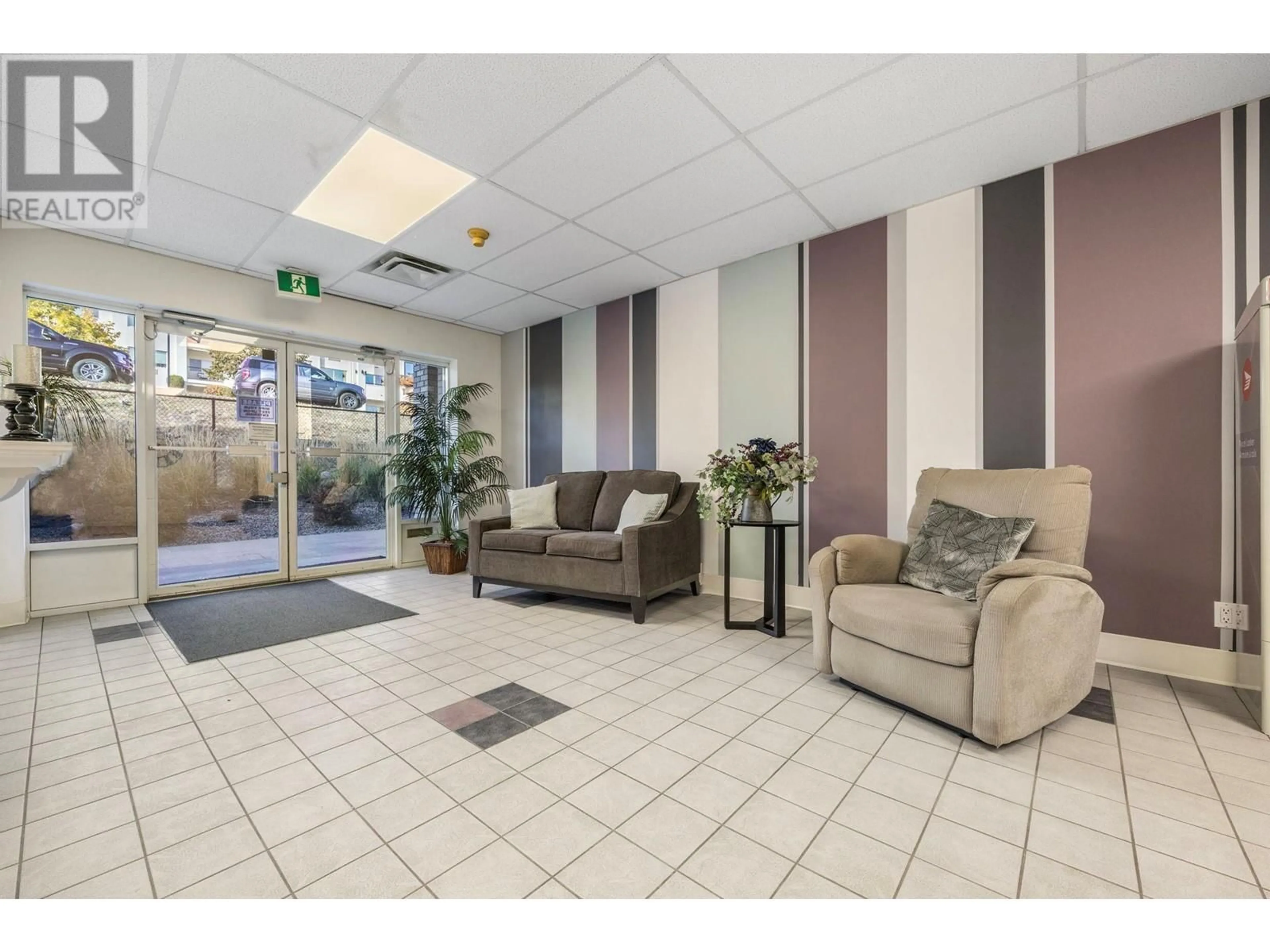 Indoor lobby, carpet floors for 2477 Ingram Road Unit# 110, West Kelowna British Columbia V4T1W7